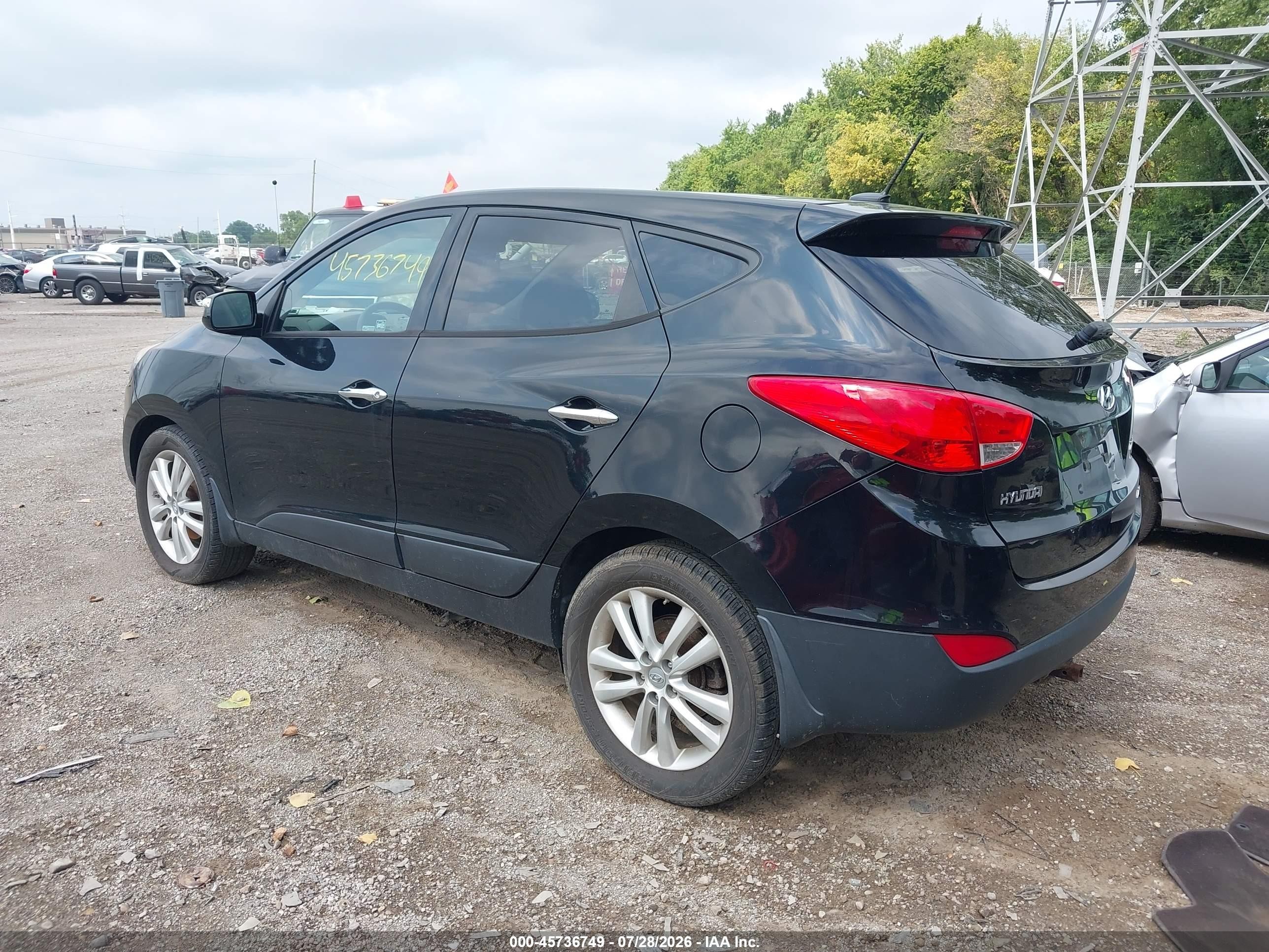 2011 Hyundai Tucson Limited Черный vin: KM8JUCAC4BU294481
