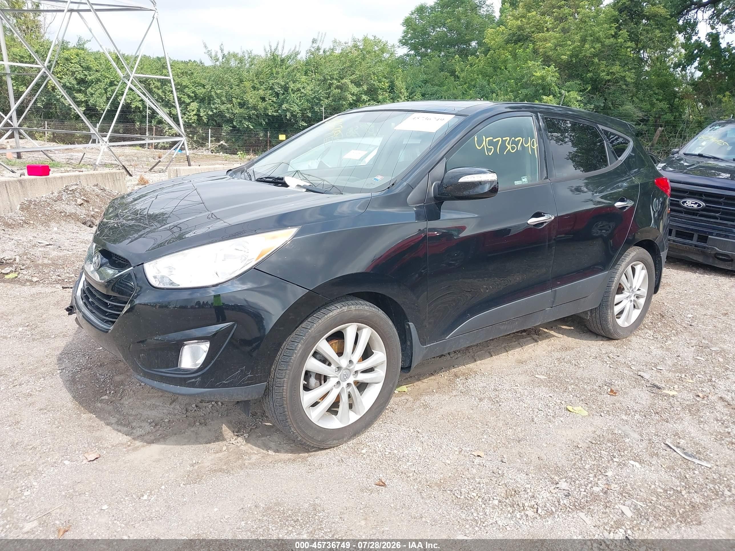 2011 Hyundai Tucson Limited Черный vin: KM8JUCAC4BU294481