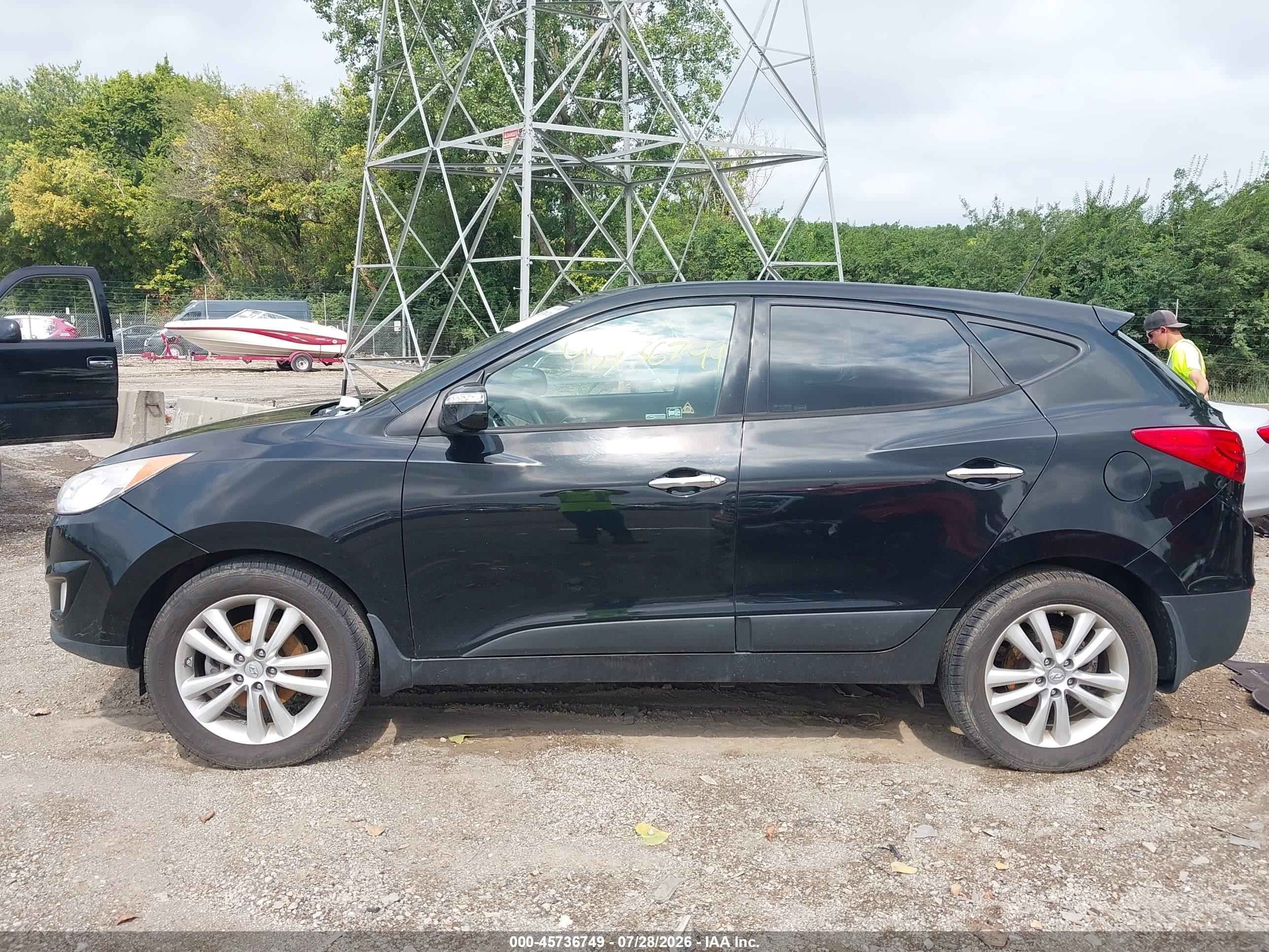 2011 Hyundai Tucson Limited Черный vin: KM8JUCAC4BU294481