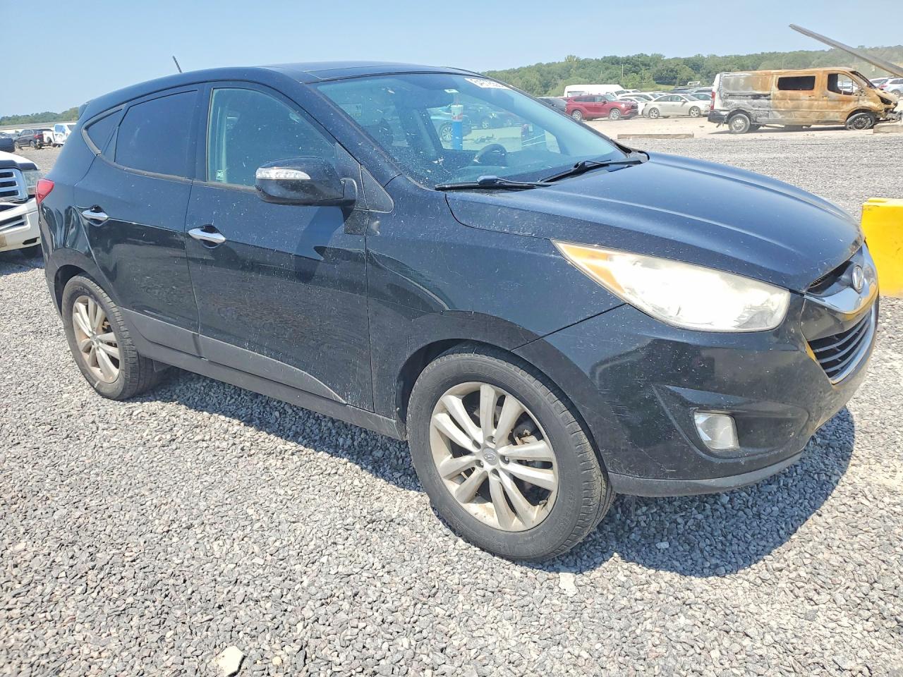 2011 Hyundai Tucson Limited Black vin: KM8JUCAC4BU294562