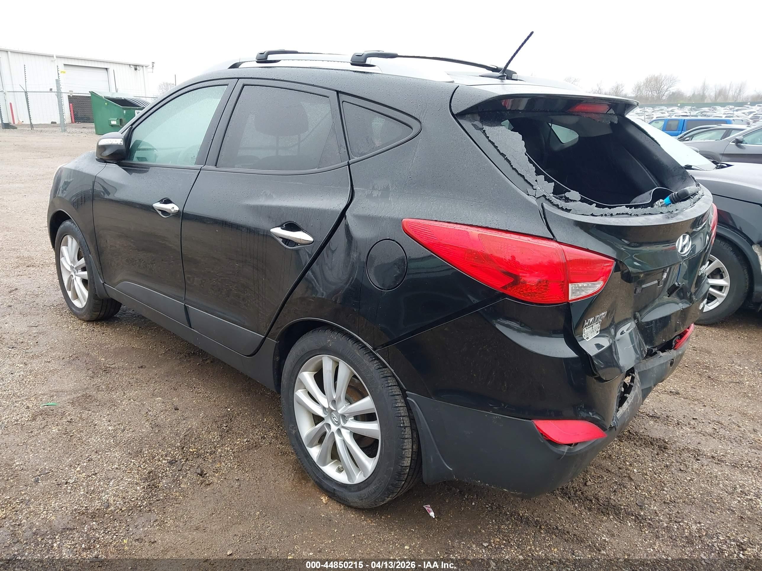 2012 Hyundai Tucson Limited Black vin: KM8JUCAC4CU475873