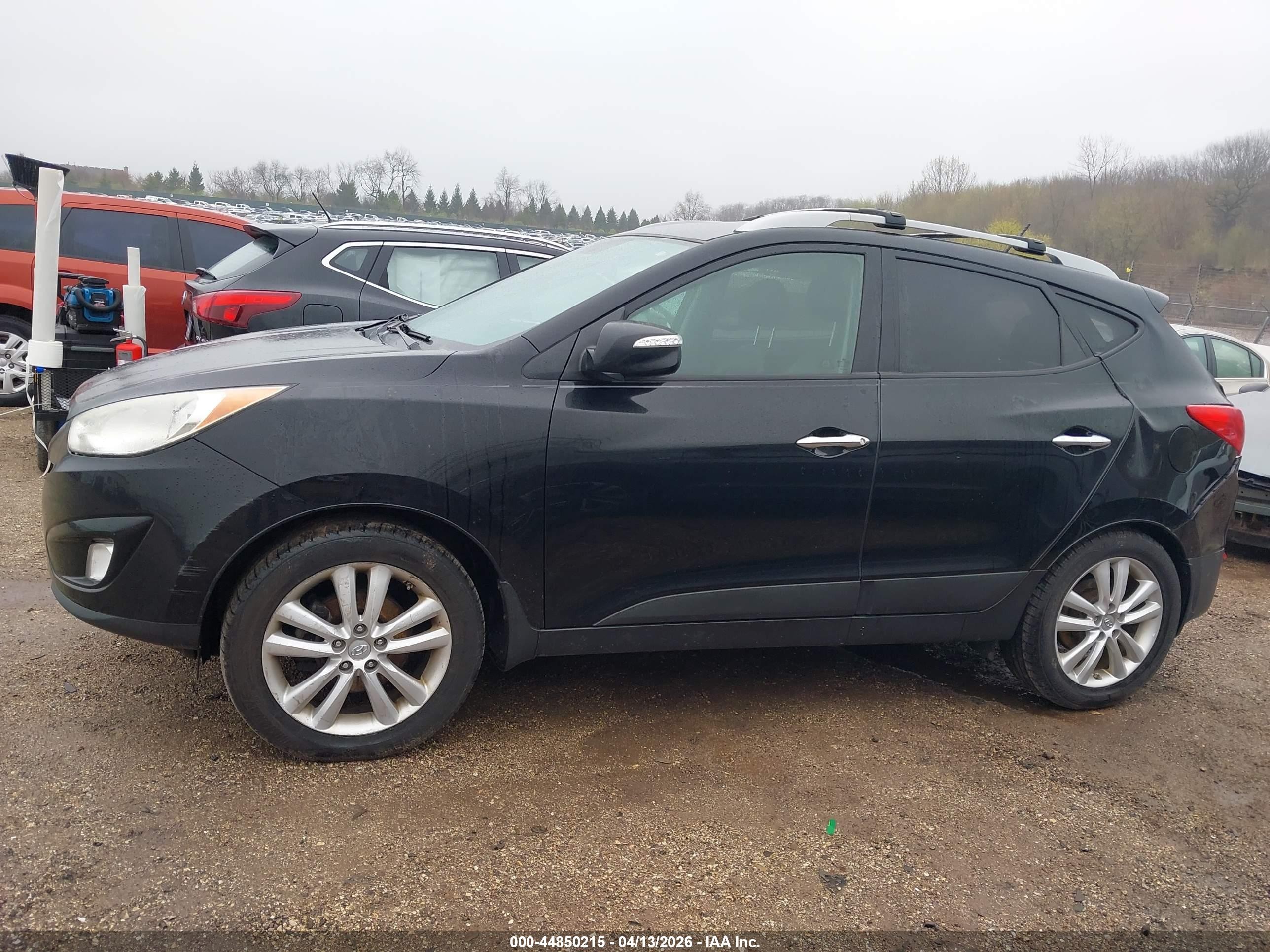 2012 Hyundai Tucson Limited Black vin: KM8JUCAC4CU475873