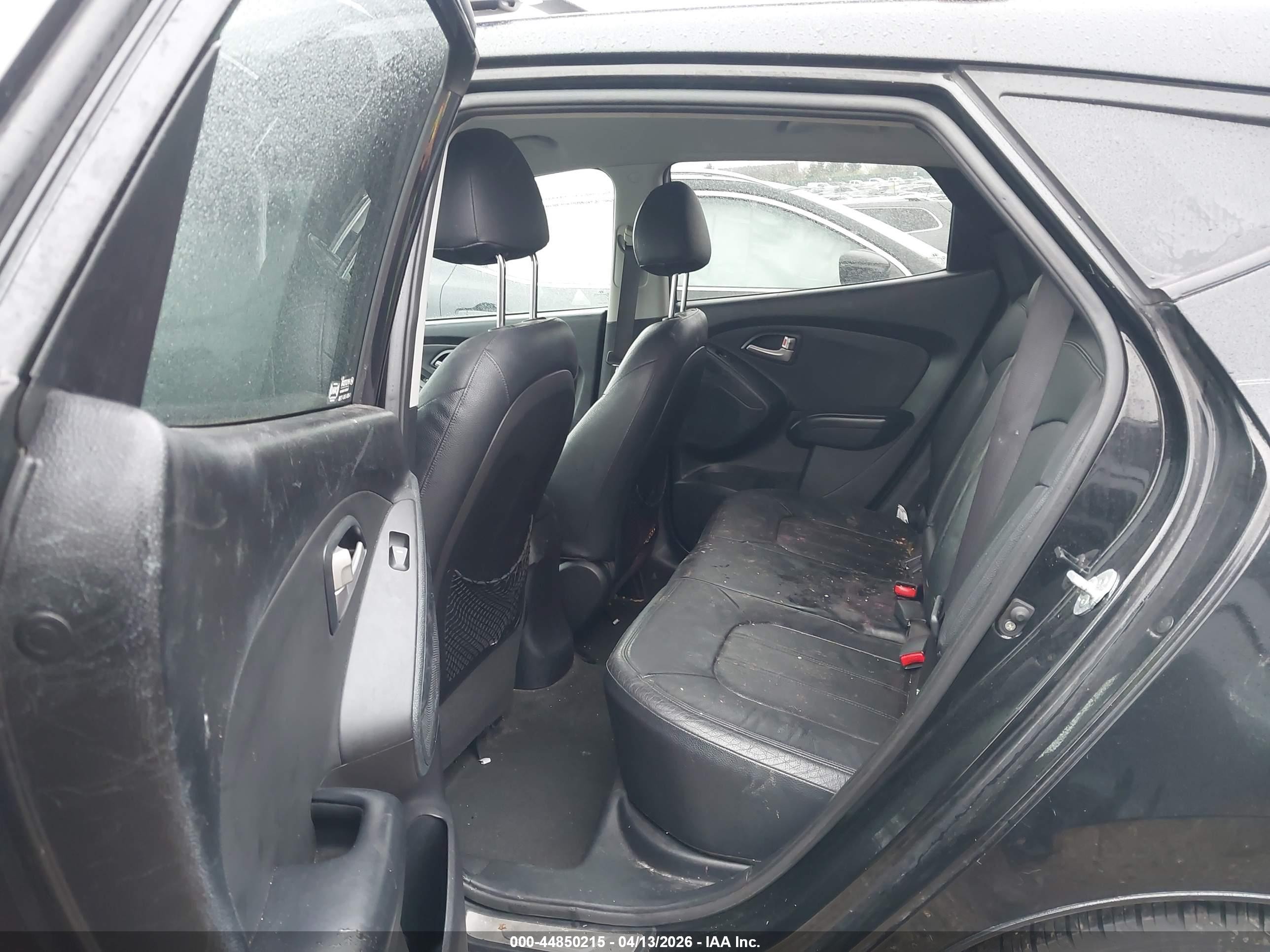 2012 Hyundai Tucson Limited Black vin: KM8JUCAC4CU475873