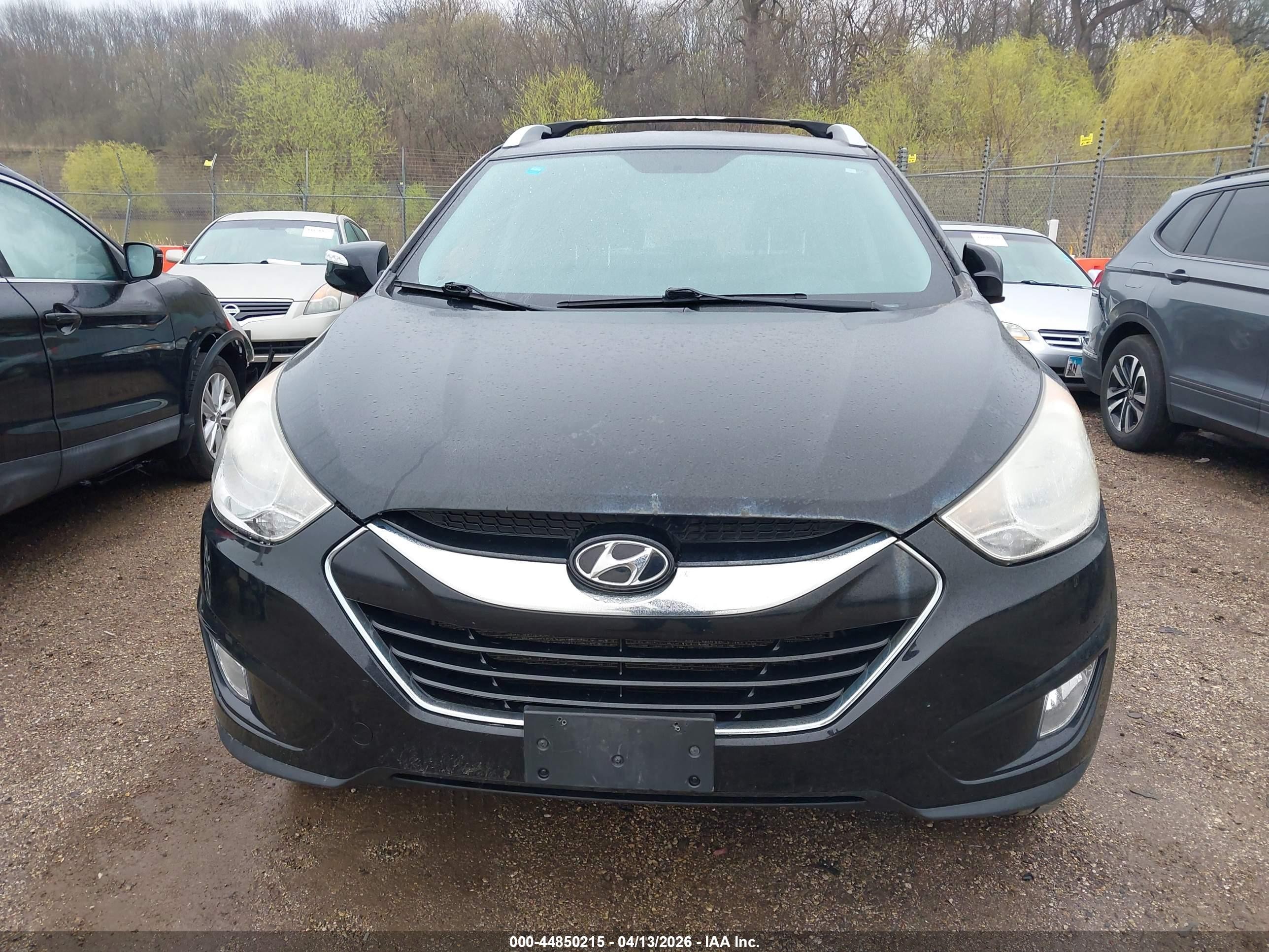 2012 Hyundai Tucson Limited Black vin: KM8JUCAC4CU475873
