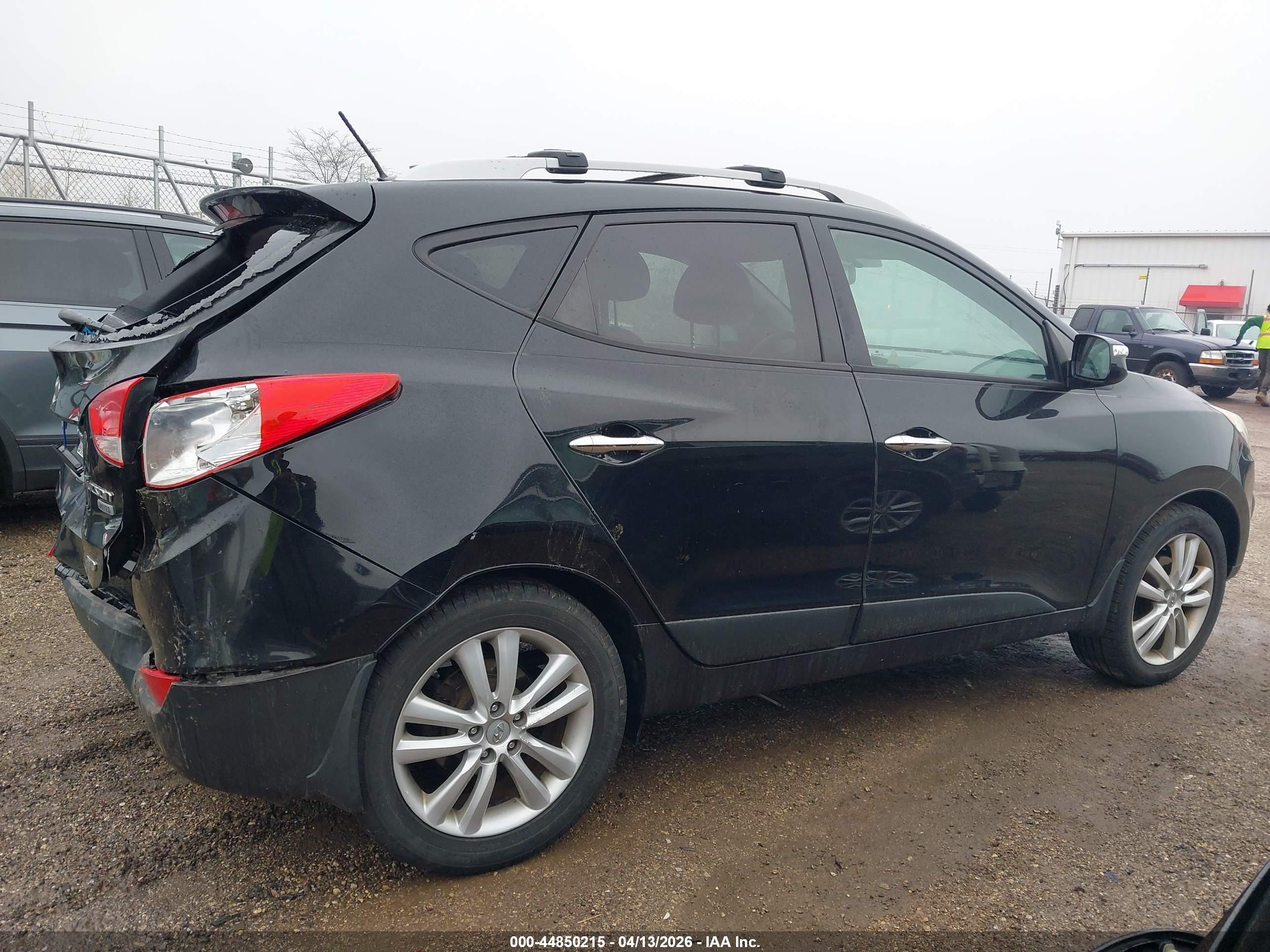 2012 Hyundai Tucson Limited Black vin: KM8JUCAC4CU475873