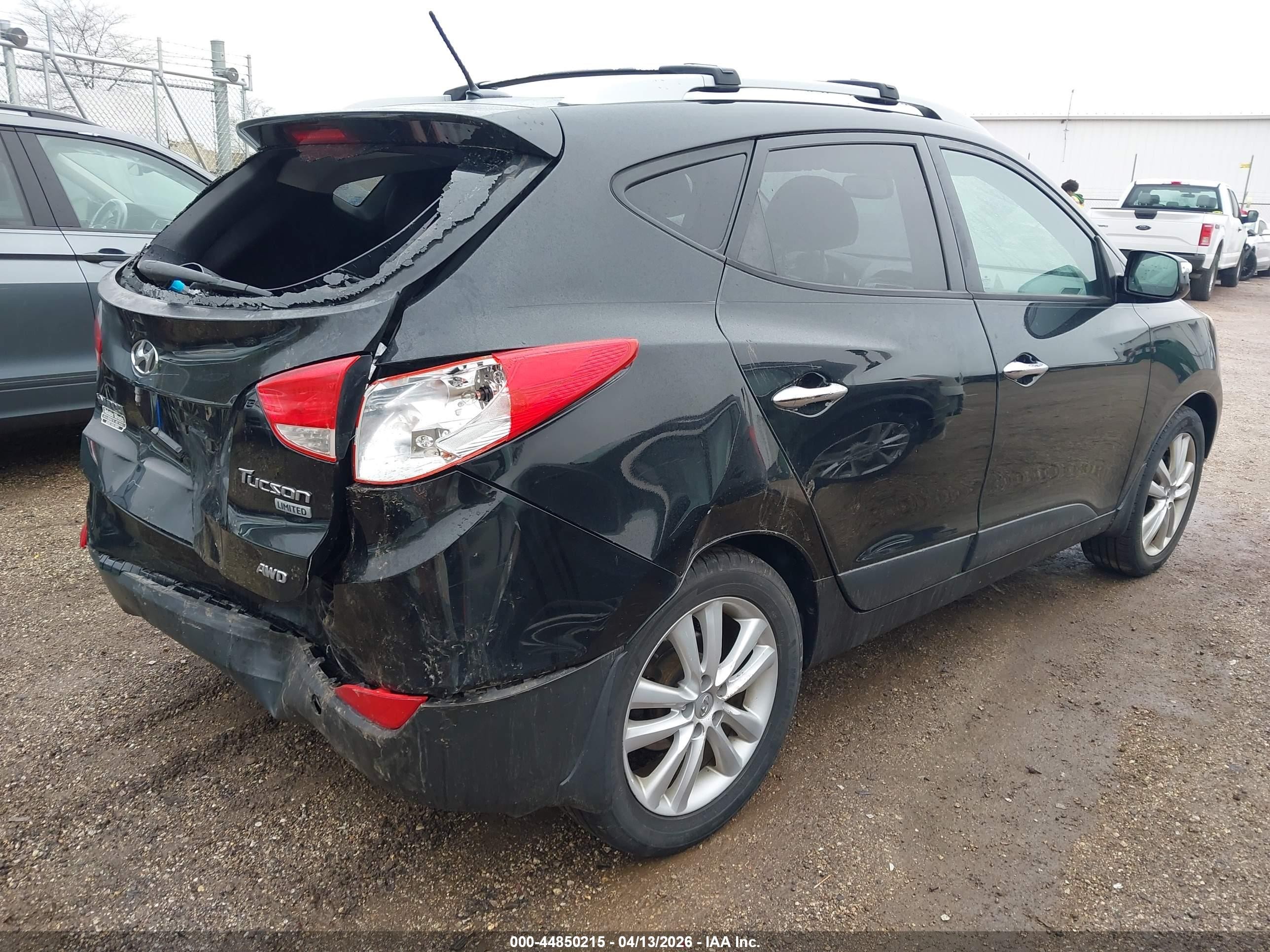2012 Hyundai Tucson Limited Black vin: KM8JUCAC4CU475873