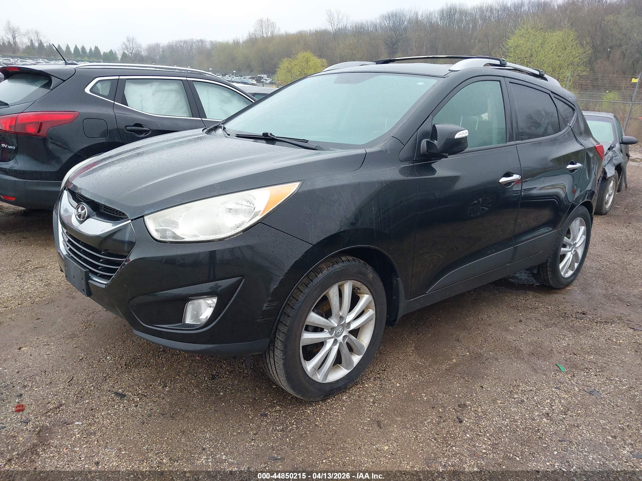 2012 Hyundai Tucson Limited Black vin: KM8JUCAC4CU475873