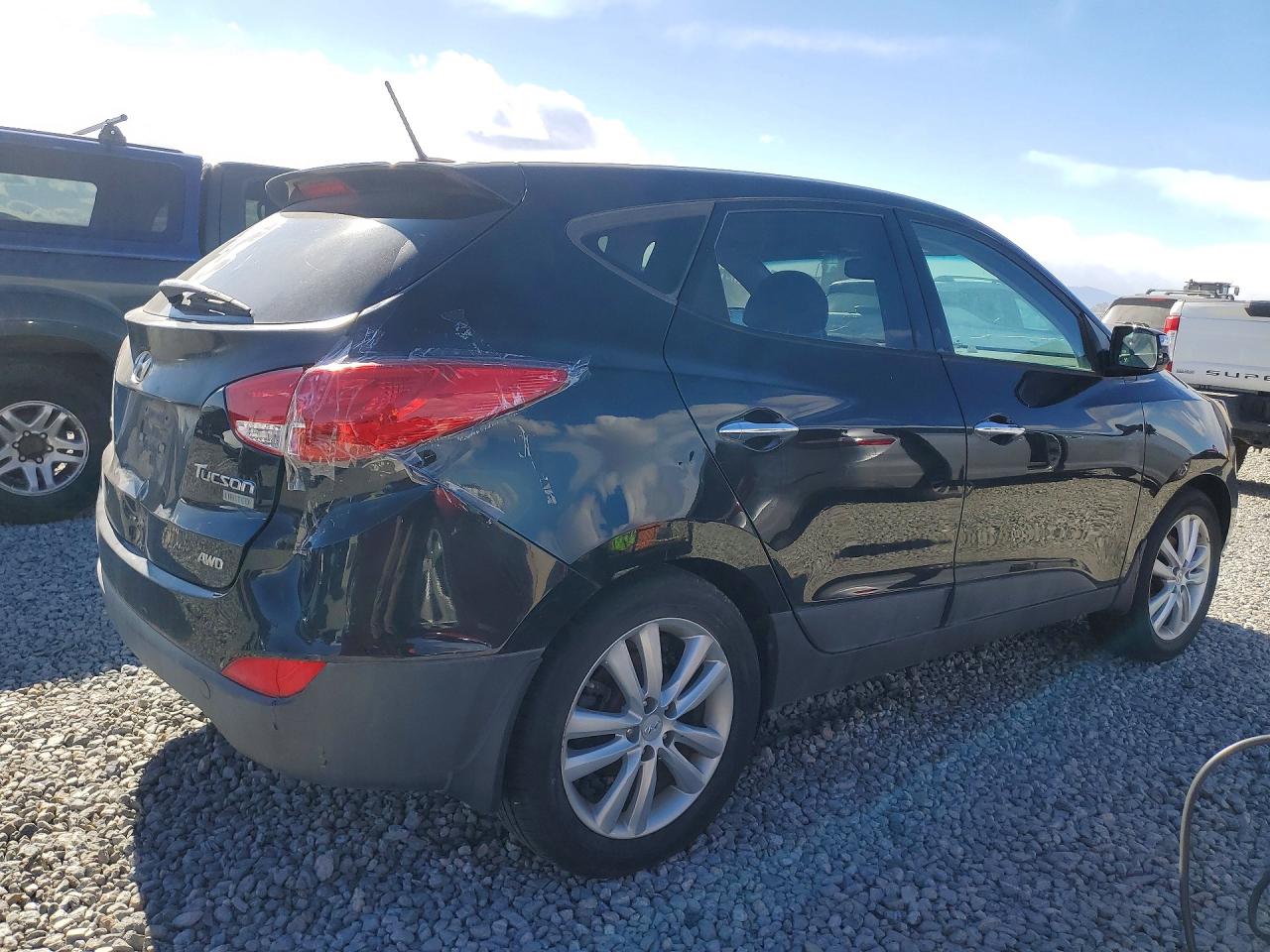 2010 Hyundai Tucson Limited Черный vin: KM8JUCAC5AU085362