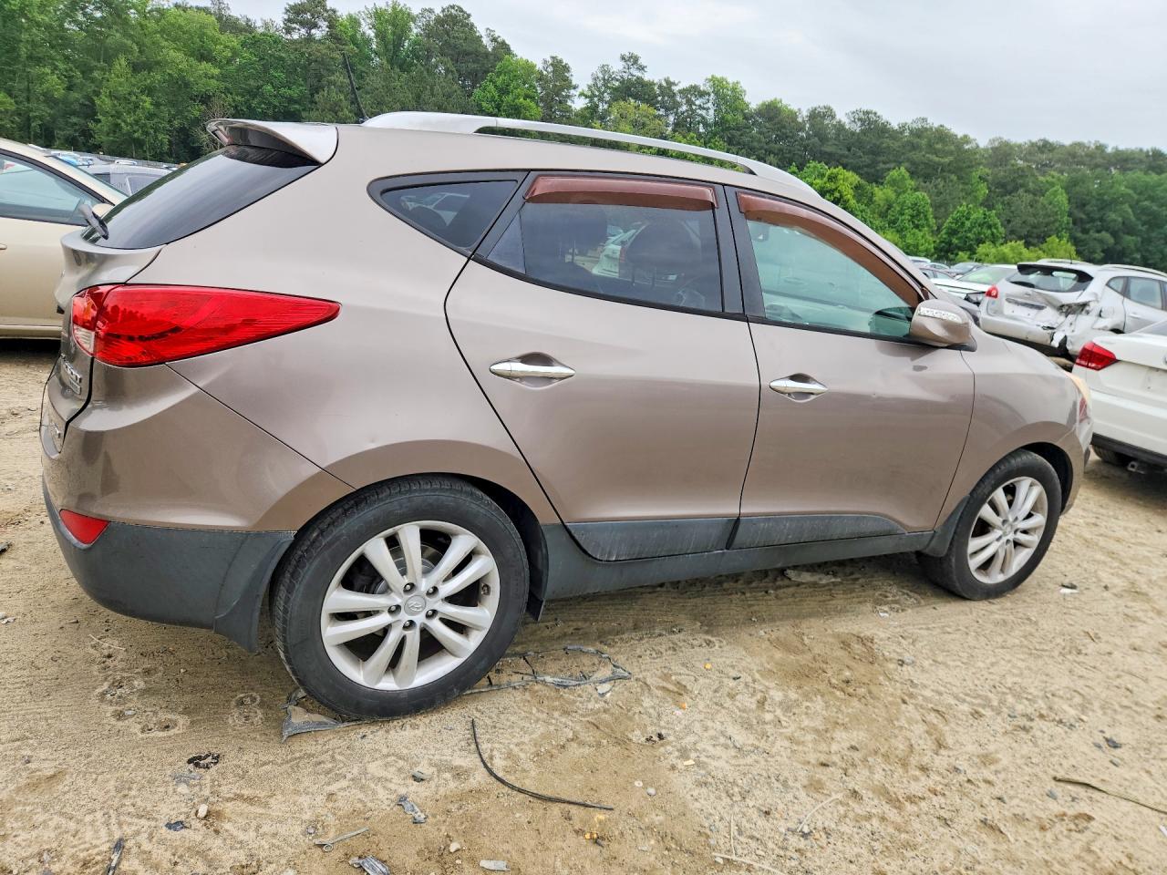 2011 Hyundai Tucson Limited Tan vin: KM8JUCAC5BU194776