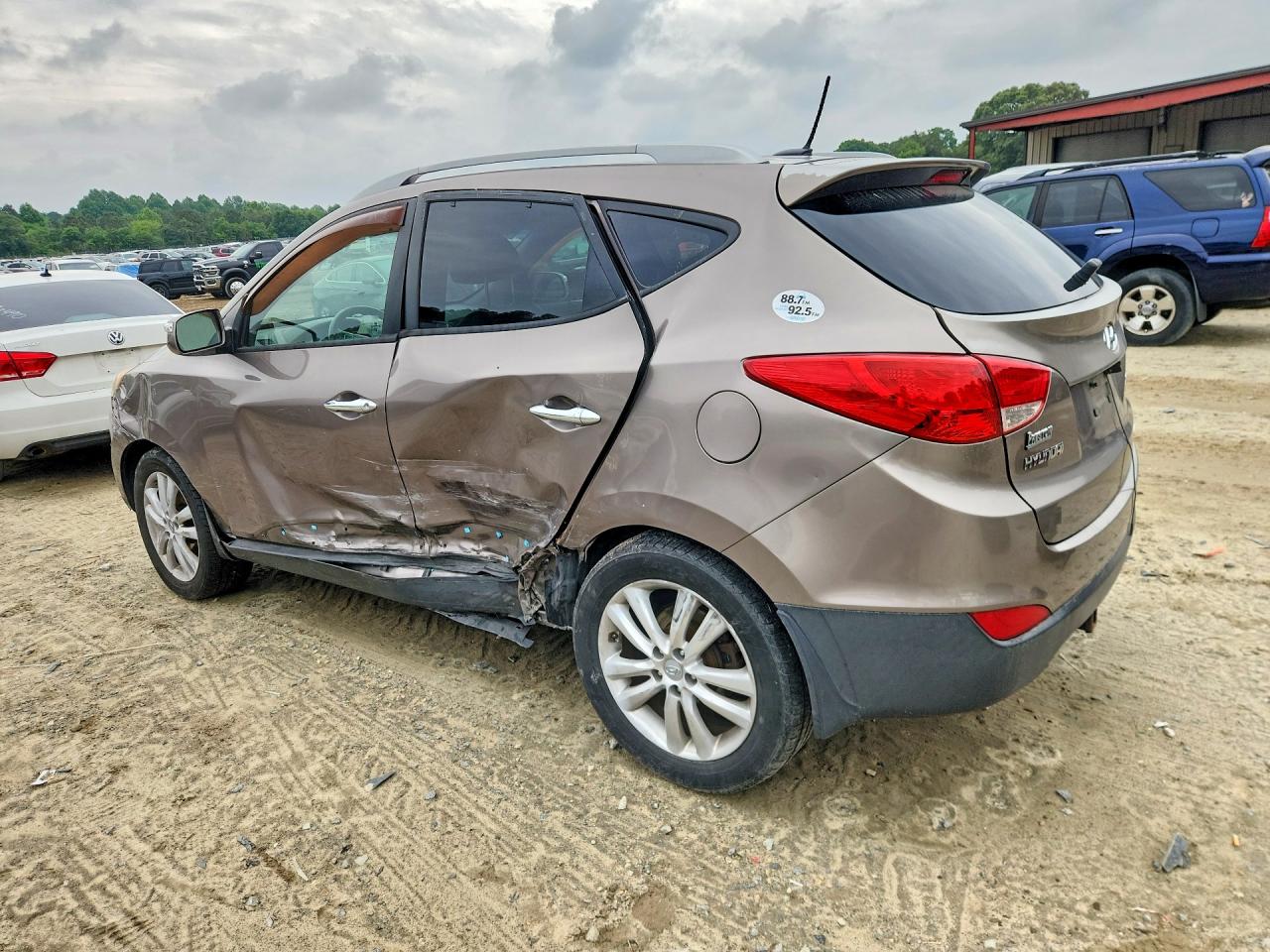 2011 Hyundai Tucson Limited Tan vin: KM8JUCAC5BU194776