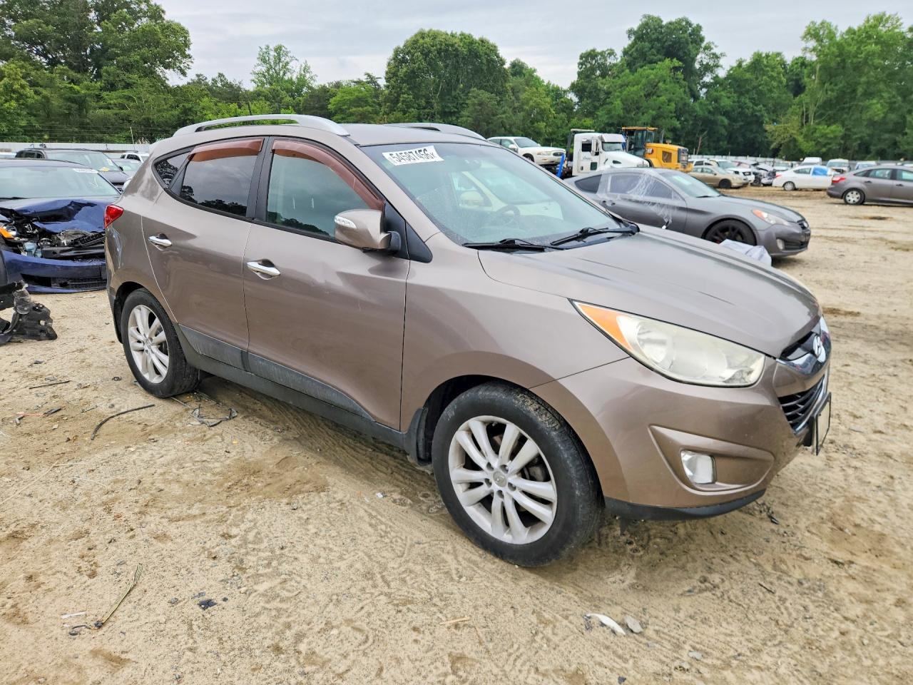 2011 Hyundai Tucson Limited Tan vin: KM8JUCAC5BU194776