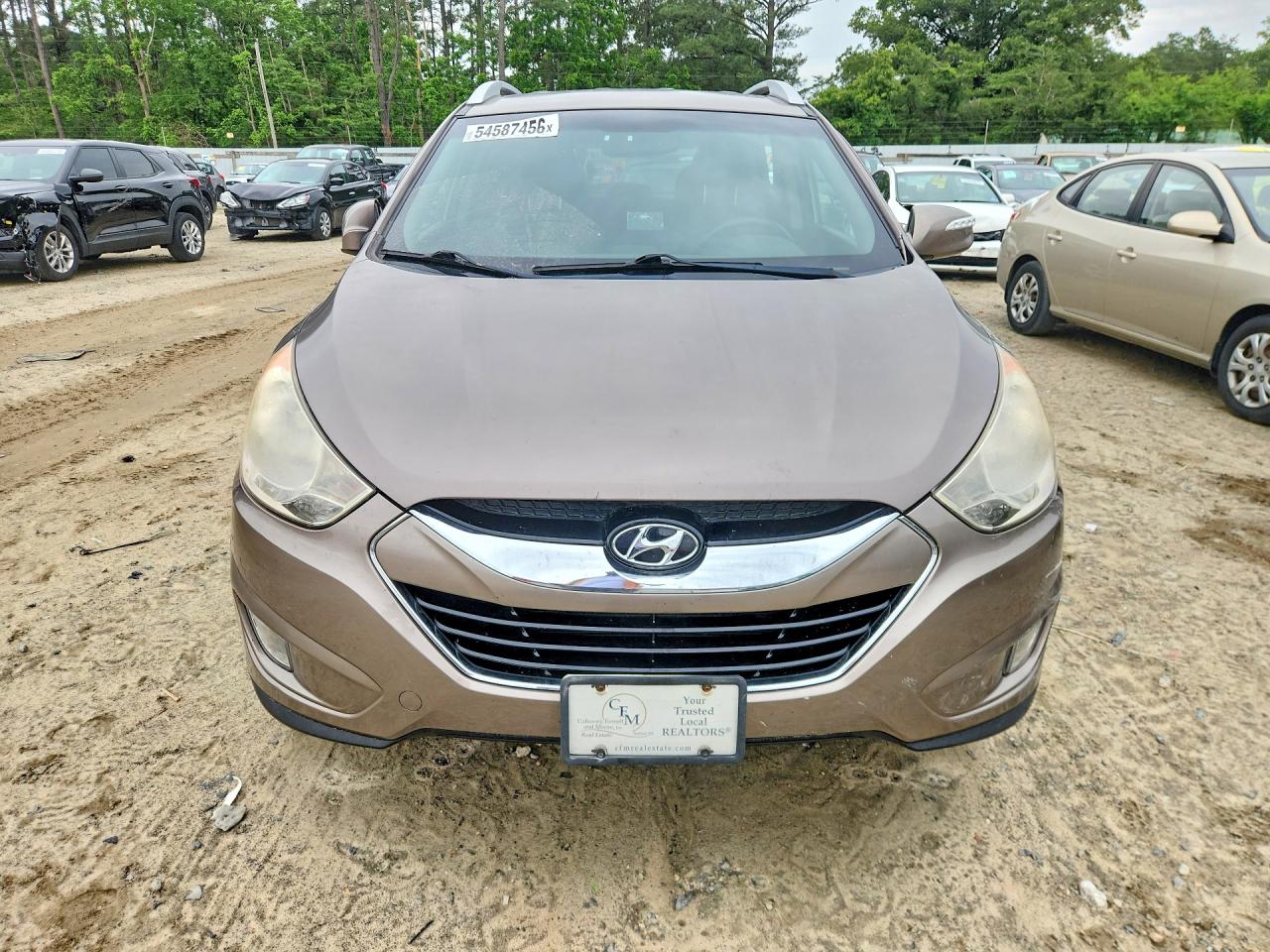2011 Hyundai Tucson Limited Tan vin: KM8JUCAC5BU194776