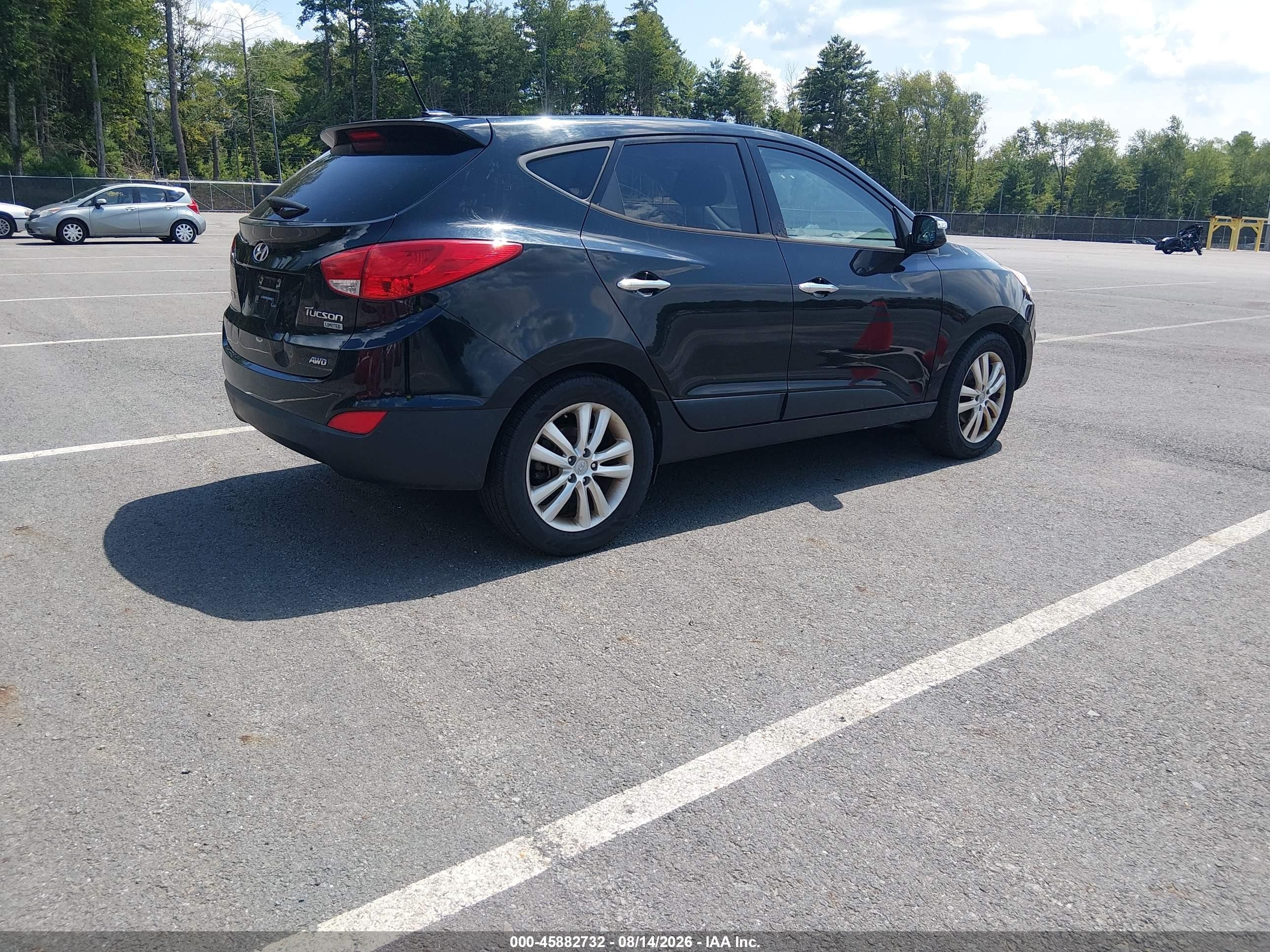 2012 Hyundai Tucson Limited Black vin: KM8JUCAC5CU381534