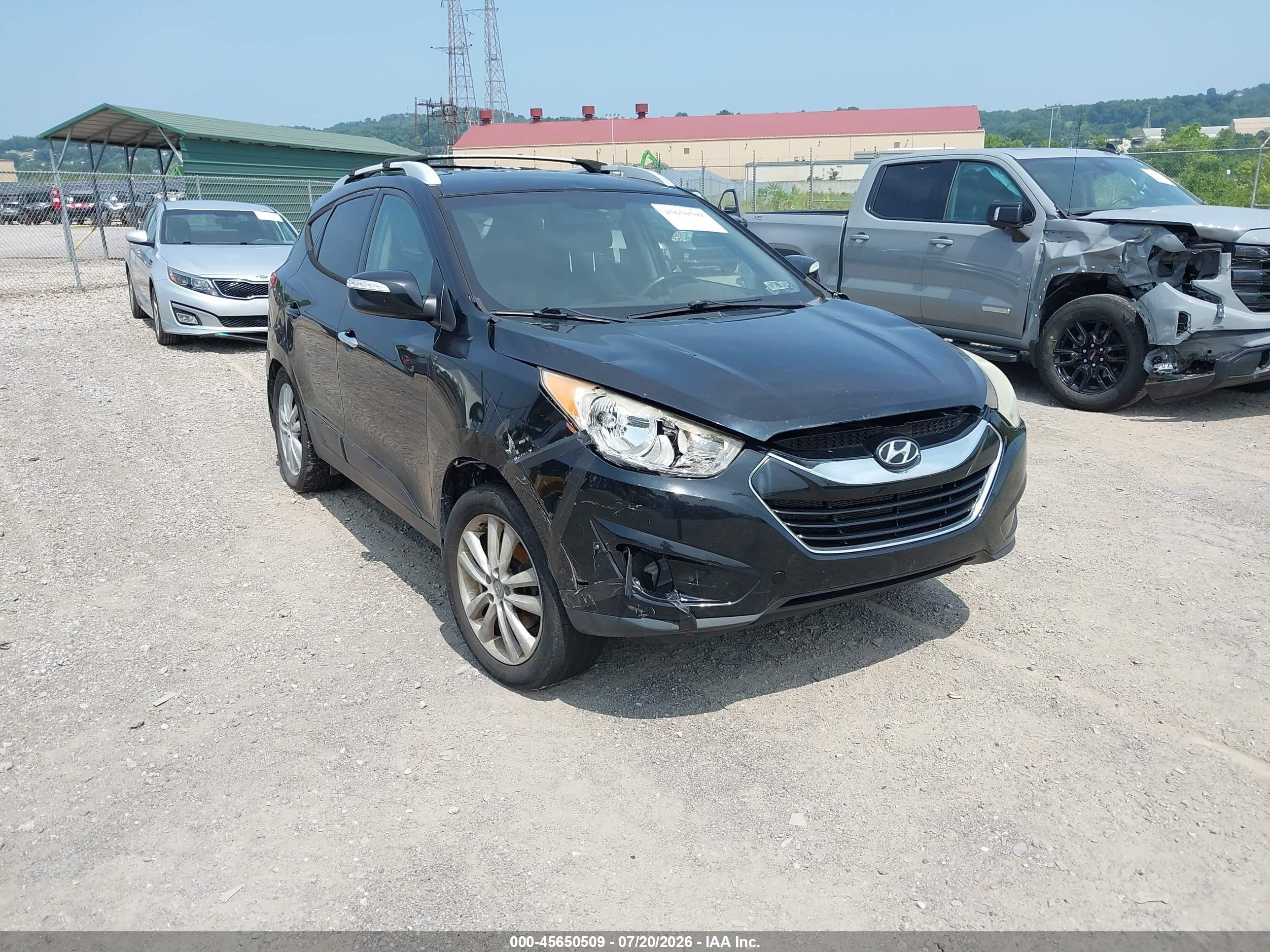 2012 Hyundai Tucson Limited Black vin: KM8JUCAC5CU424544