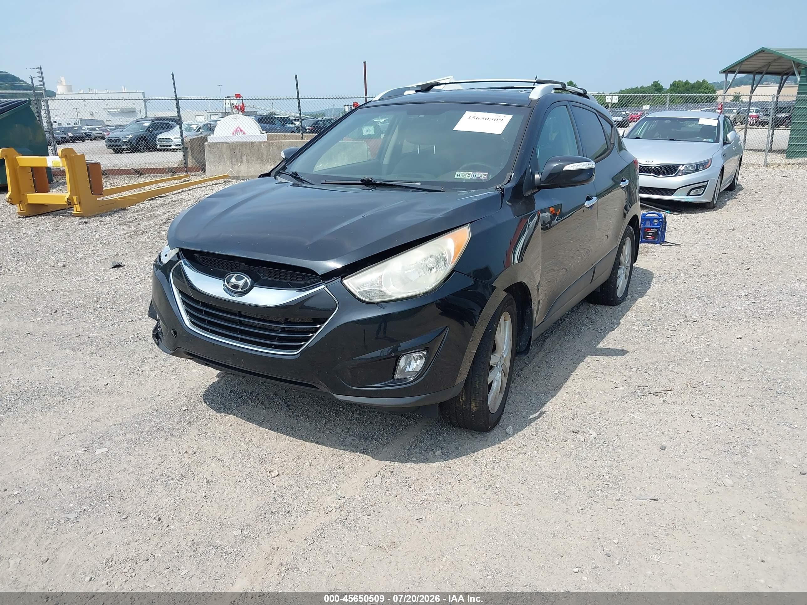 2012 Hyundai Tucson Limited Black vin: KM8JUCAC5CU424544