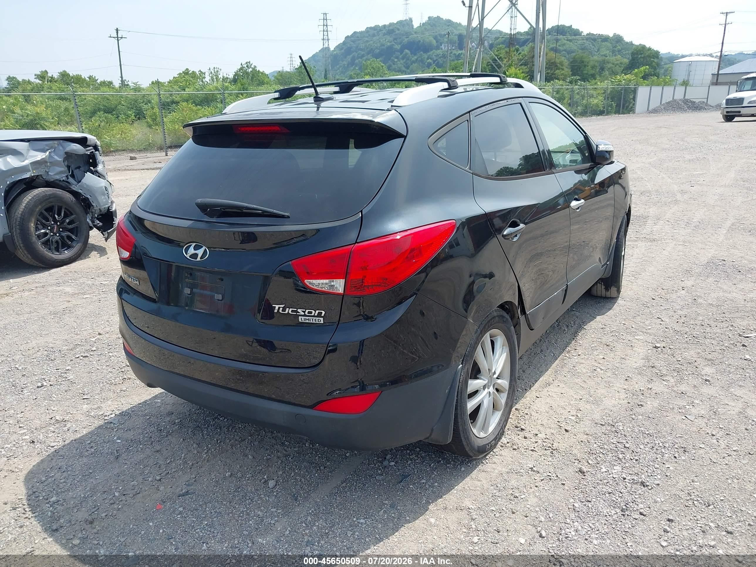 2012 Hyundai Tucson Limited Black vin: KM8JUCAC5CU424544
