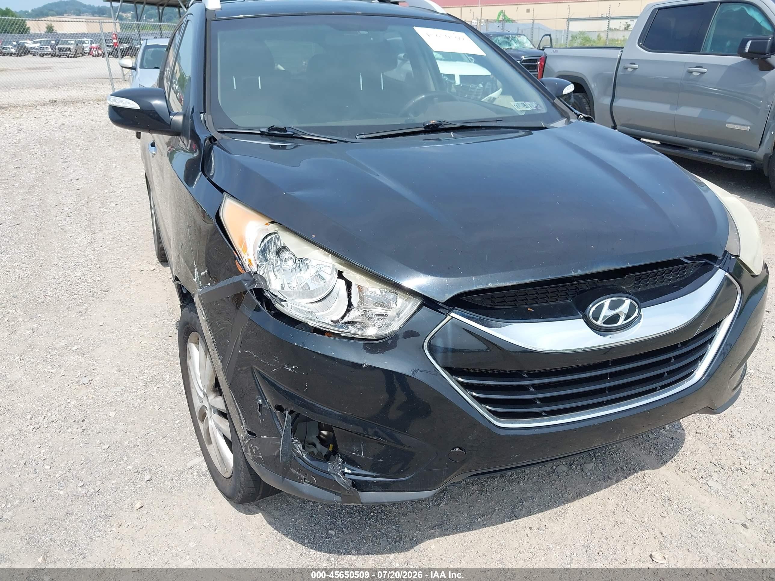 2012 Hyundai Tucson Limited Black vin: KM8JUCAC5CU424544