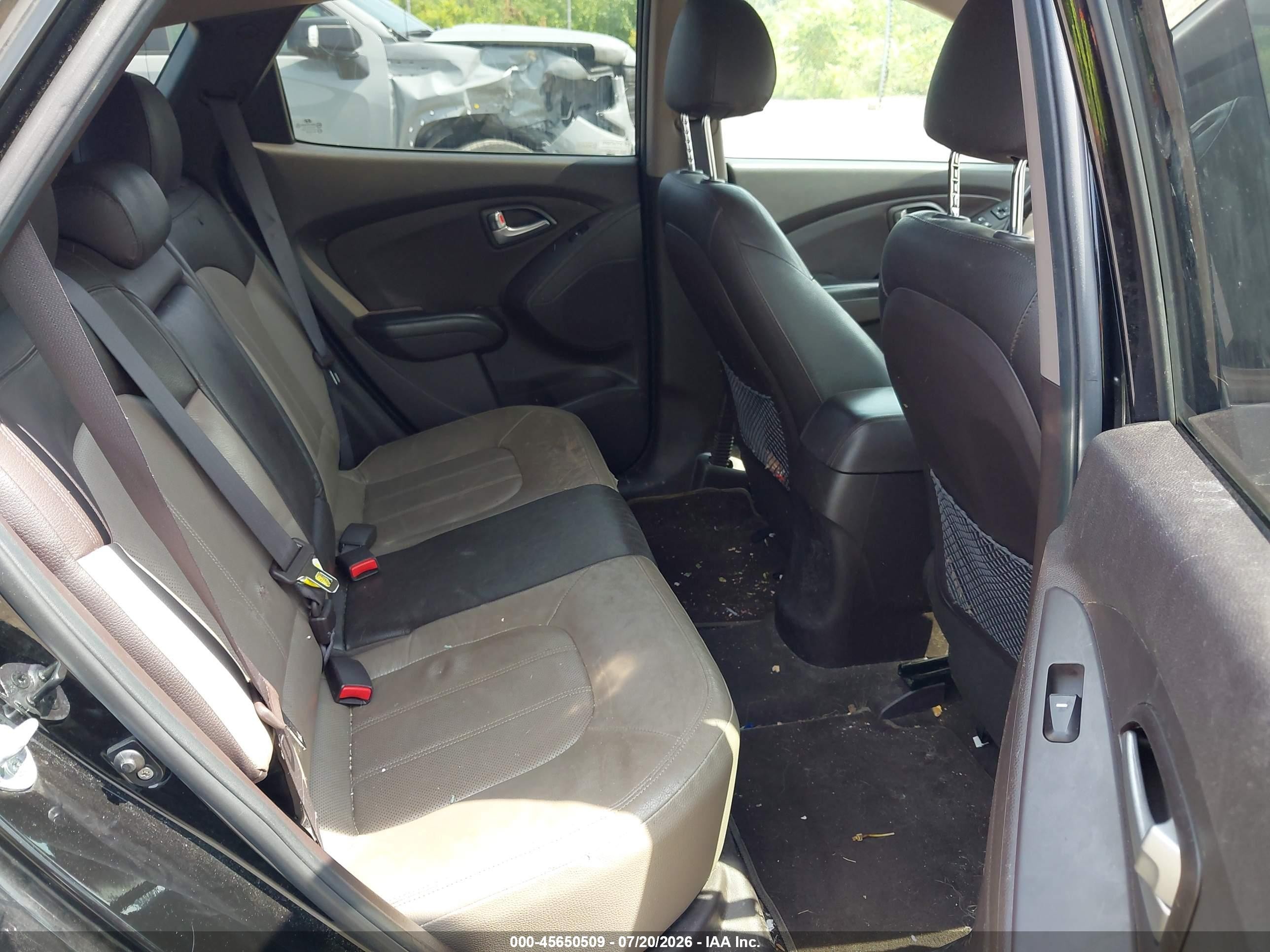 2012 Hyundai Tucson Limited Black vin: KM8JUCAC5CU424544