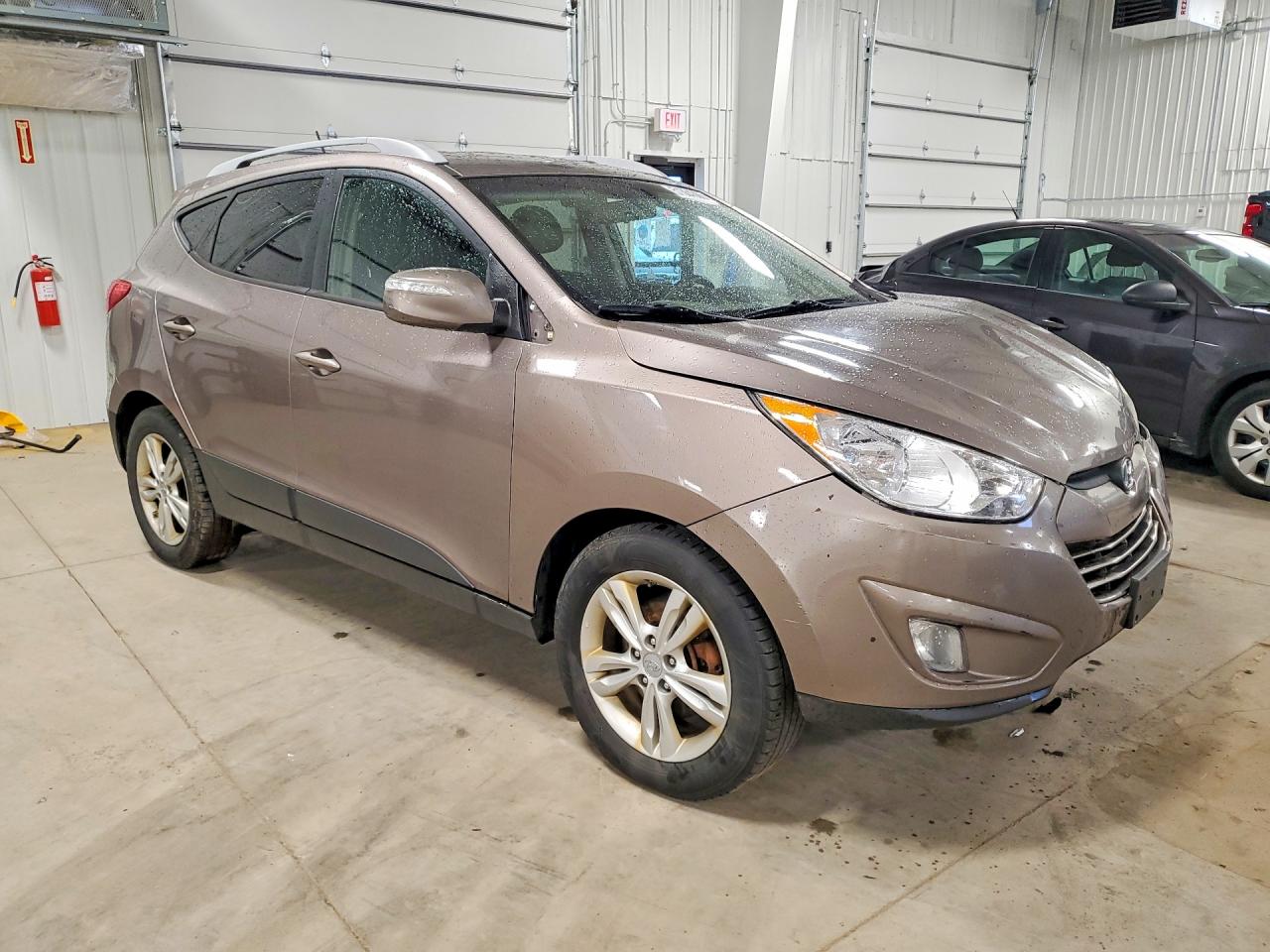 2013 Hyundai Tucson Brown vin: KM8JUCAC5DU563350