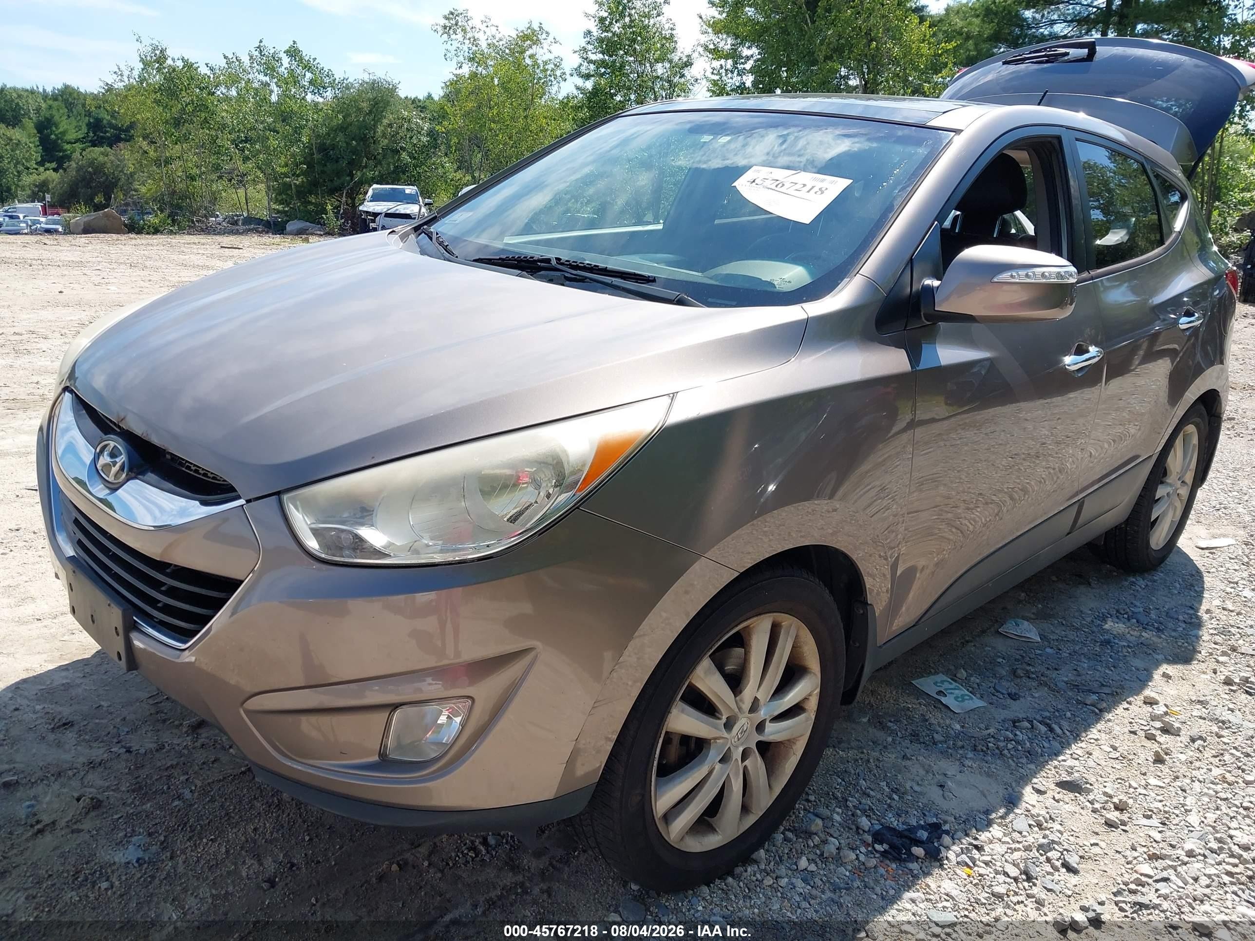 2013 Hyundai Tucson Limited Beige vin: KM8JUCAC5DU665893