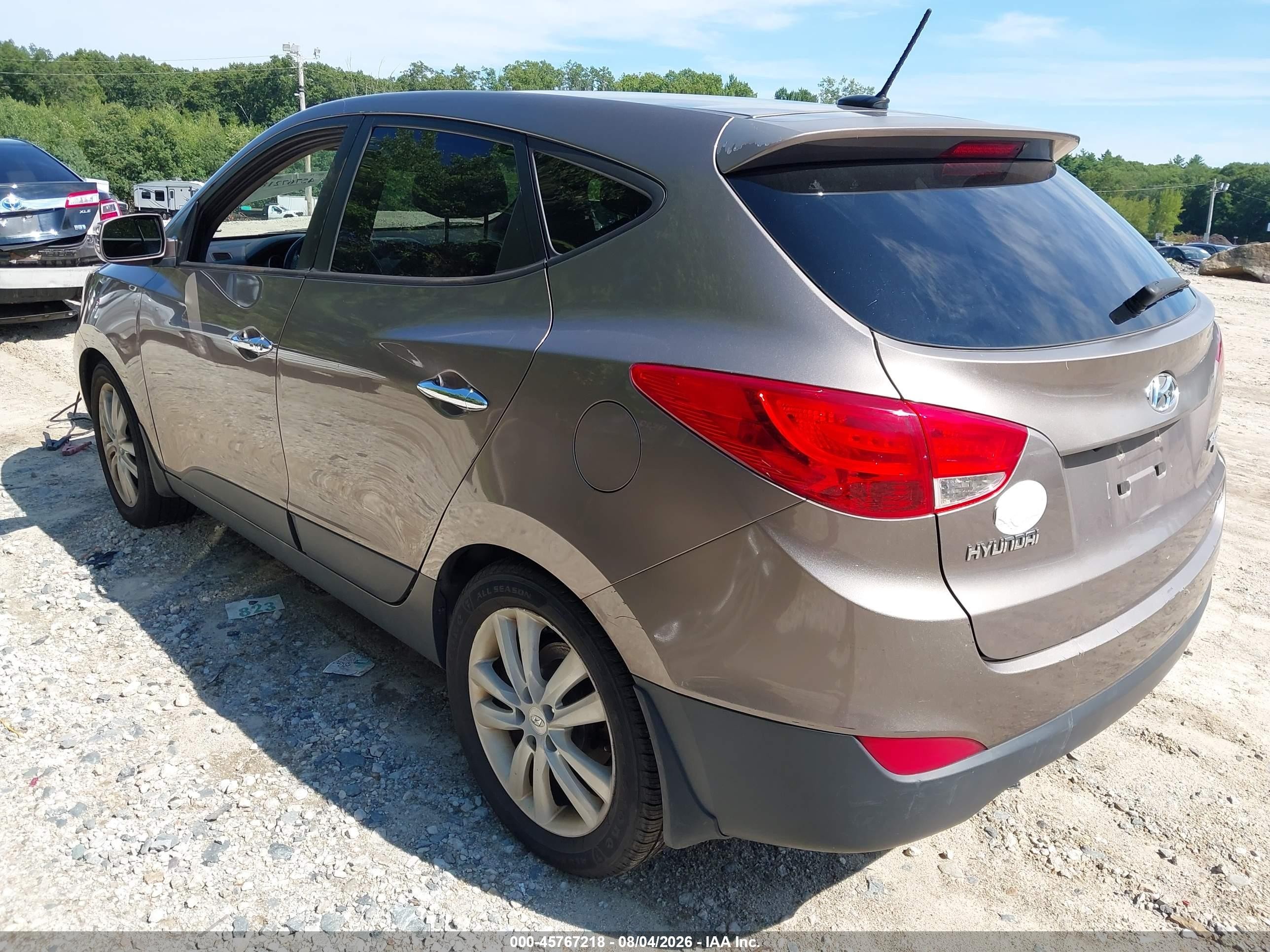 2013 Hyundai Tucson Limited Beige vin: KM8JUCAC5DU665893