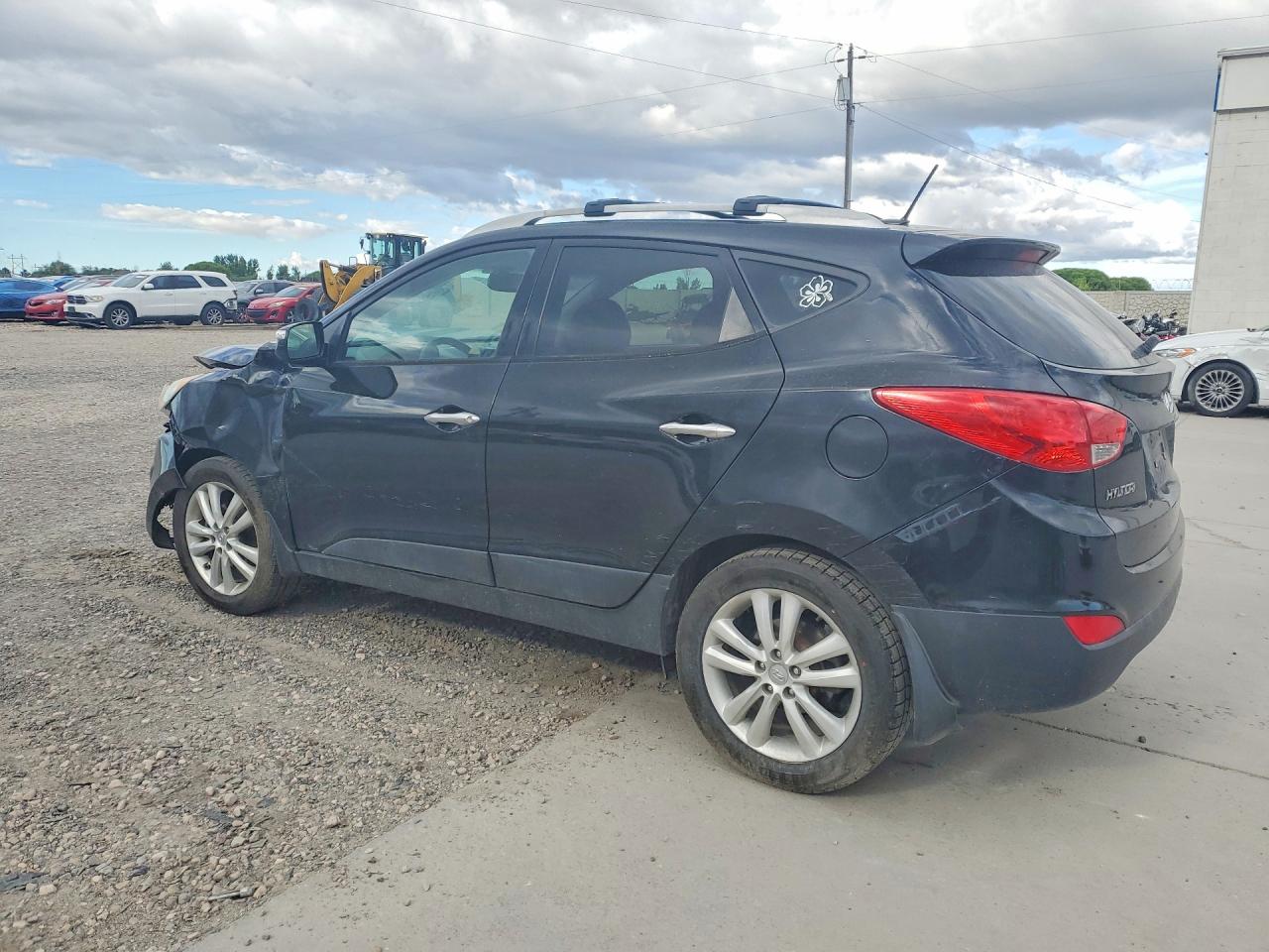 2011 Hyundai Tucson Limited Черный vin: KM8JUCAC6BU291095