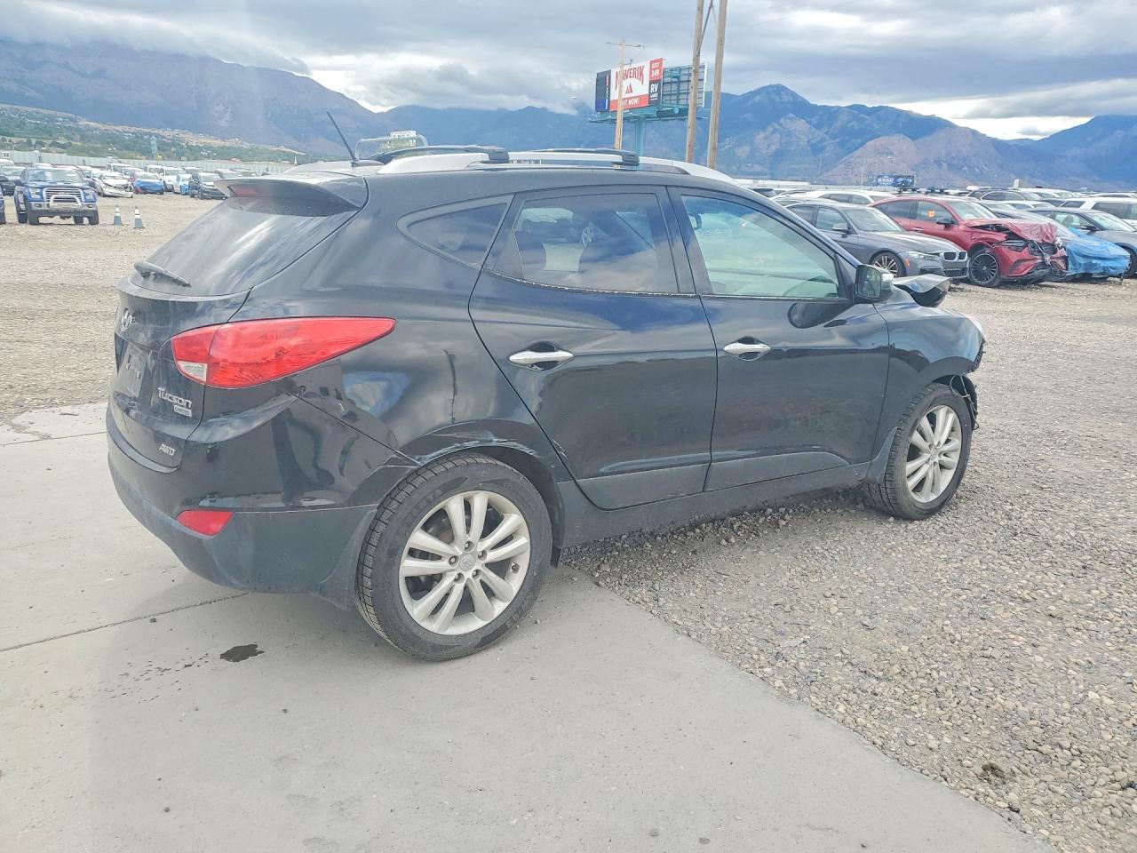 2011 Hyundai Tucson Limited Черный vin: KM8JUCAC6BU291095
