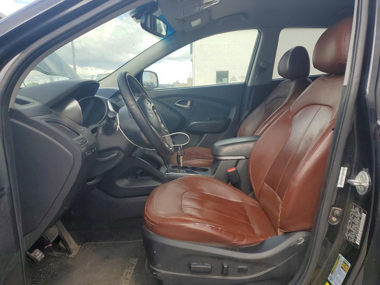 2011 Hyundai Tucson Limited Черный vin: KM8JUCAC6BU291095