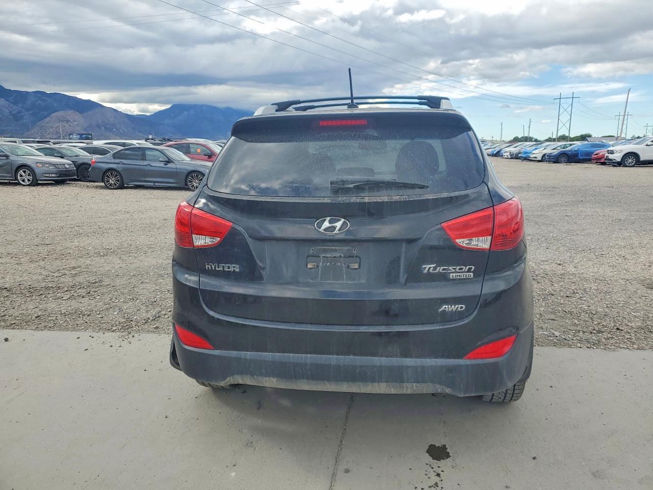 2011 Hyundai Tucson Limited Черный vin: KM8JUCAC6BU291095