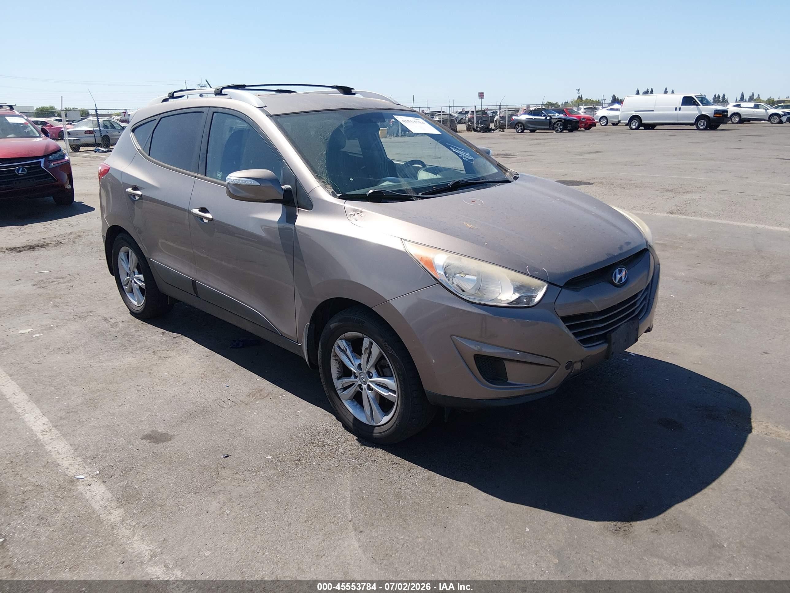 2012 Hyundai Tucson Gls Tan vin: KM8JUCAC6CU326719