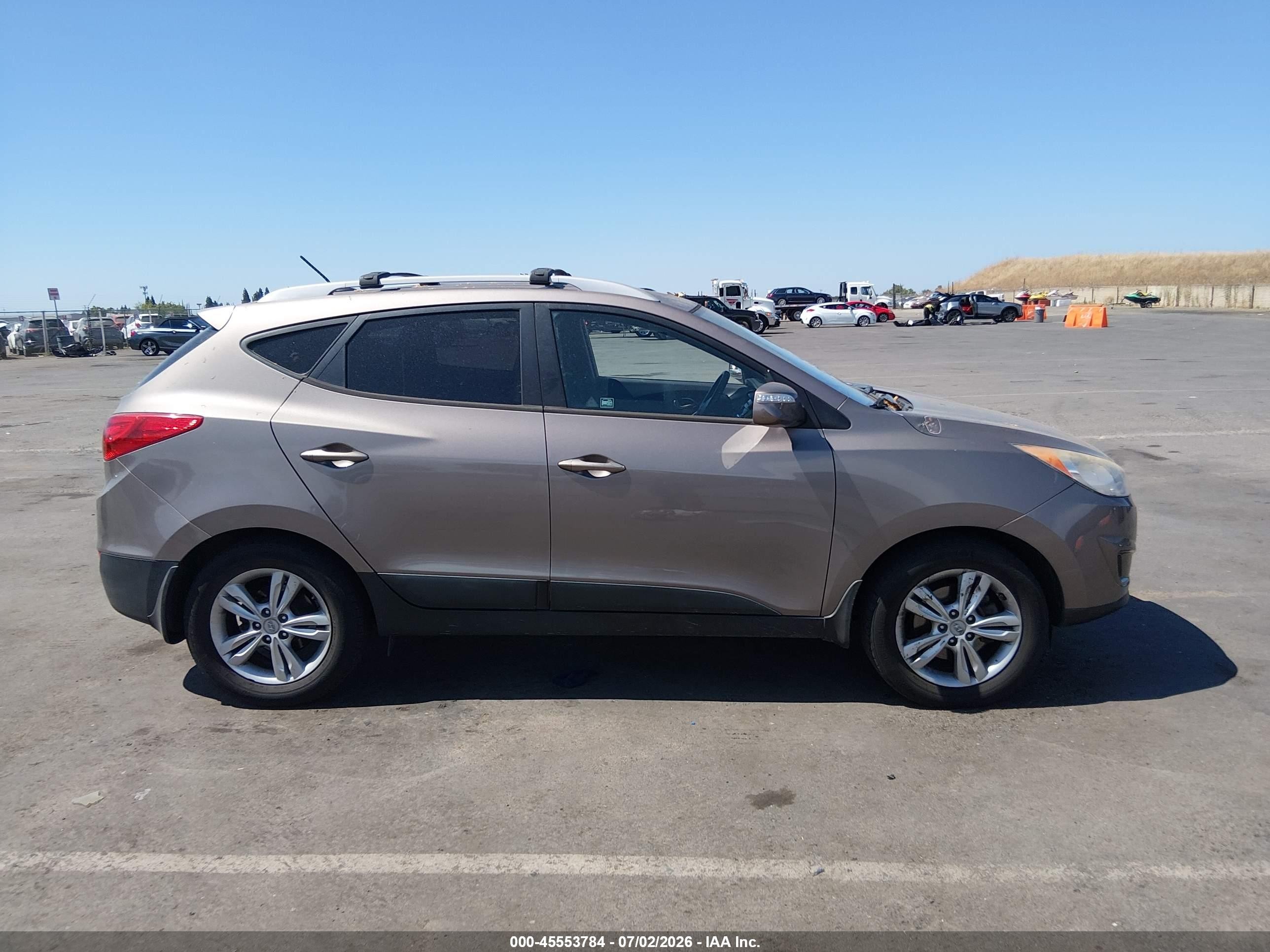 2012 Hyundai Tucson Gls Tan vin: KM8JUCAC6CU326719
