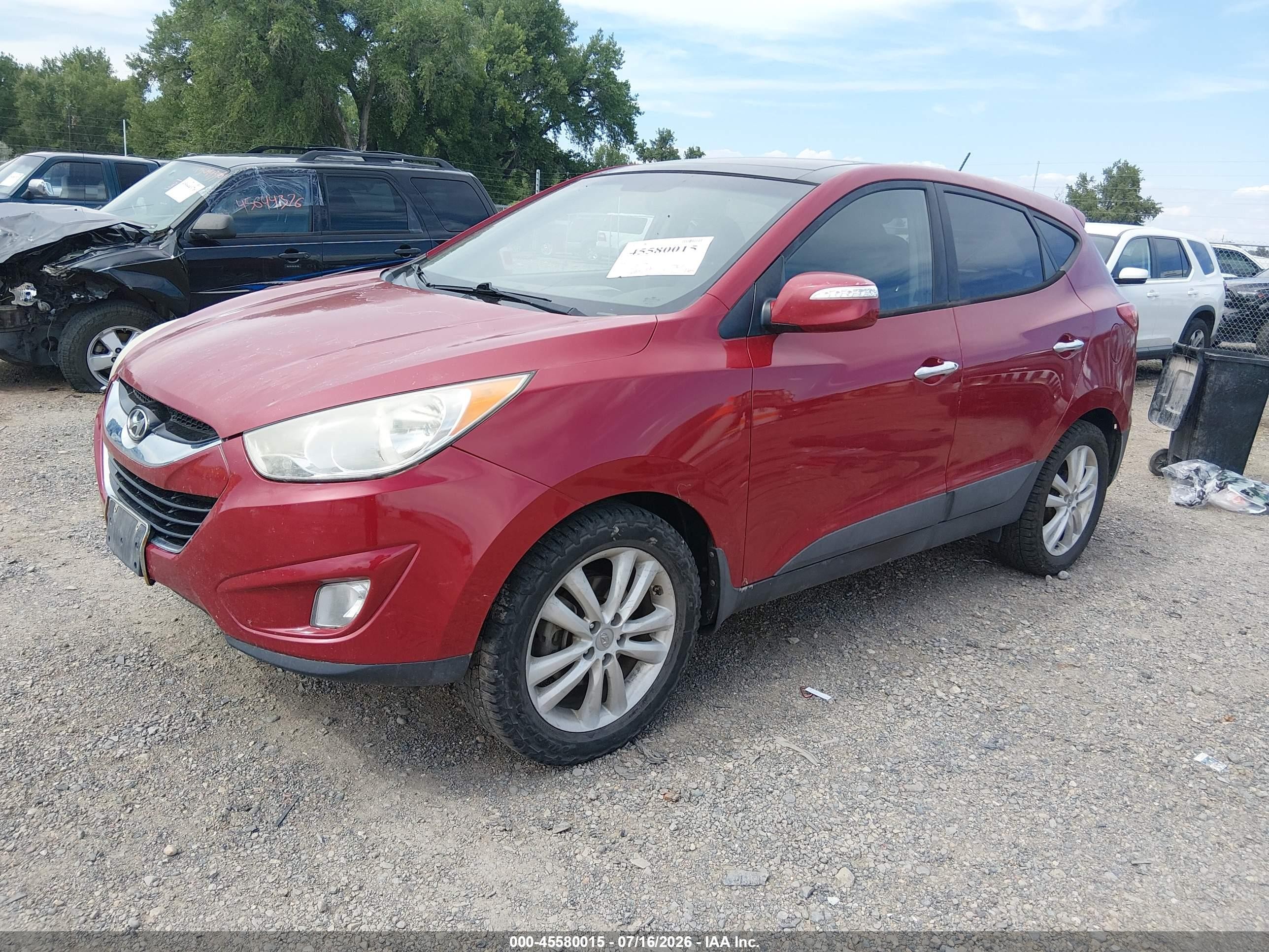 2012 Hyundai Tucson Limited Red vin: KM8JUCAC6CU349918
