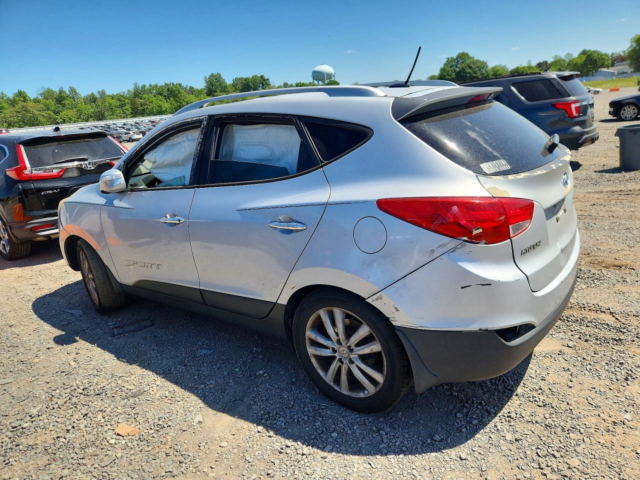 2012 Hyundai Tucson Limited Silver vin: KM8JUCAC6CU425623