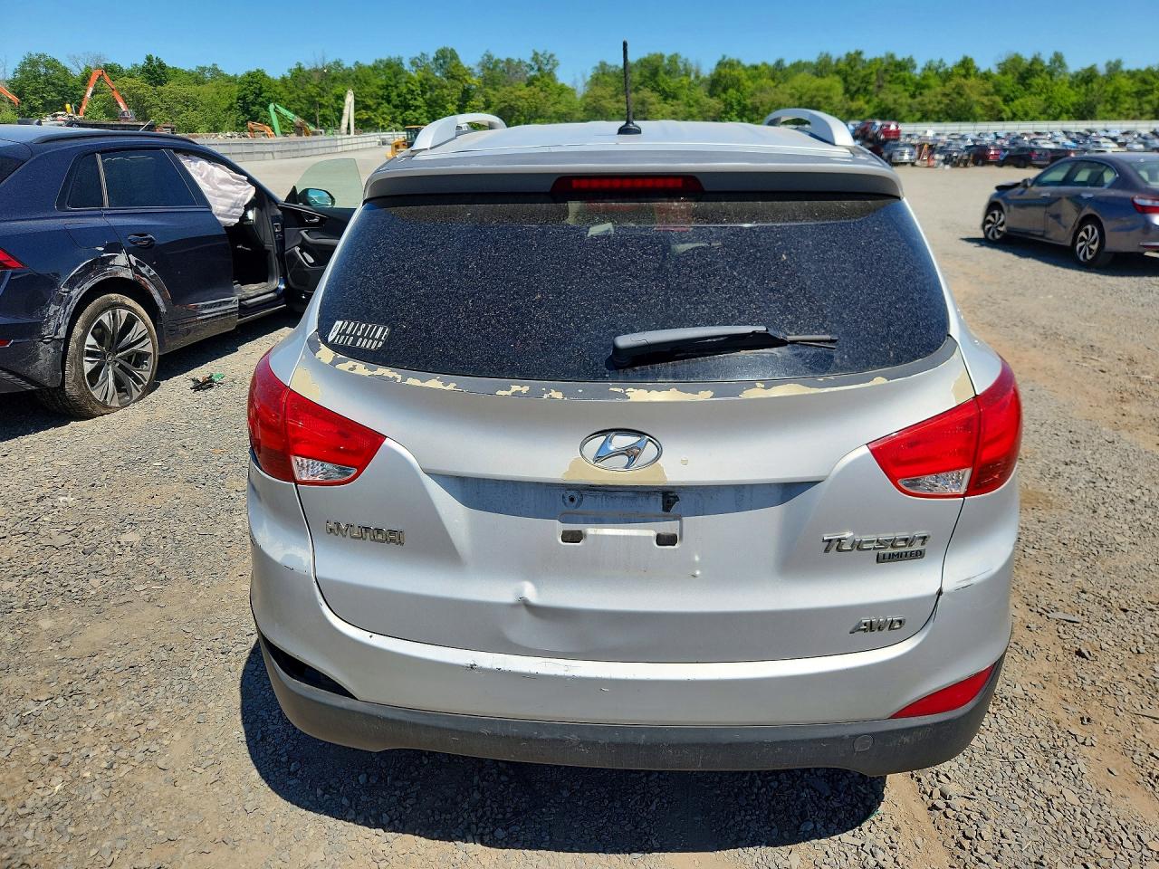 2012 Hyundai Tucson Limited Silver vin: KM8JUCAC6CU425623