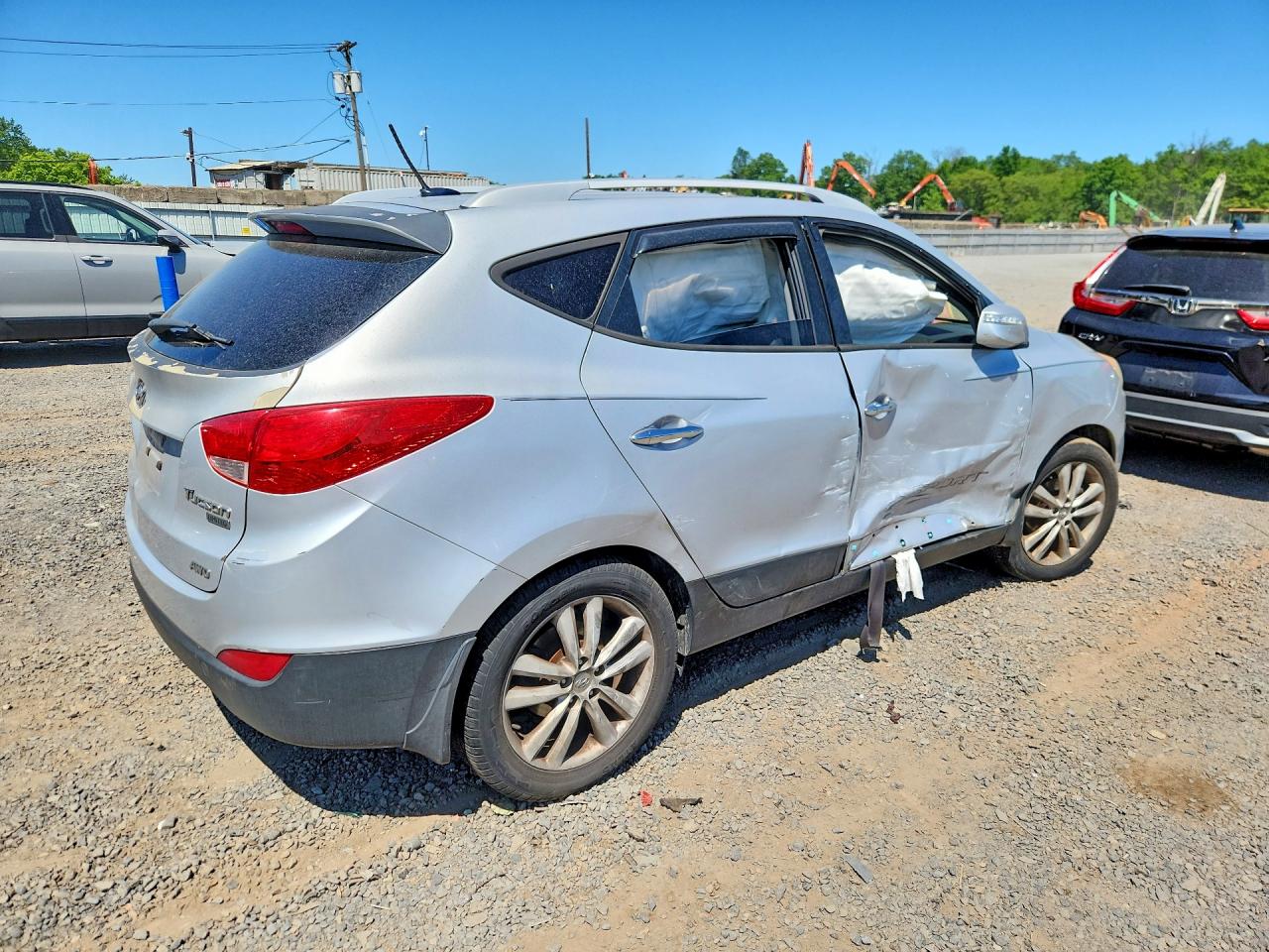 2012 Hyundai Tucson Limited Silver vin: KM8JUCAC6CU425623