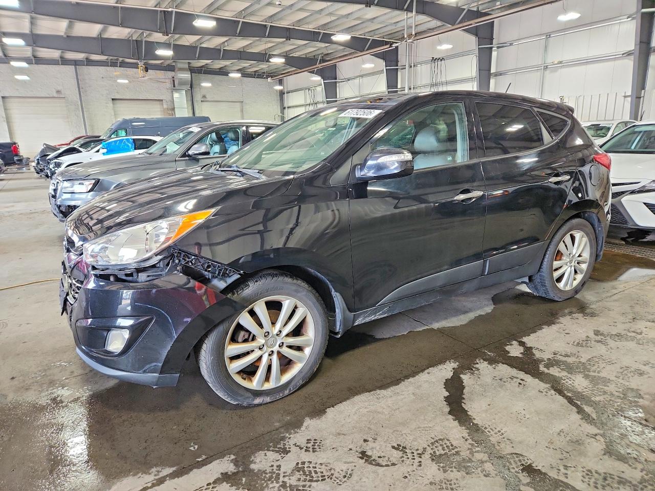 2012 Hyundai Tucson Limited Black vin: KM8JUCAC6CU475907