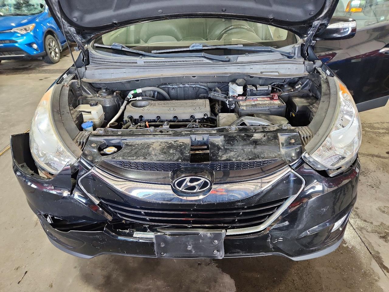 2012 Hyundai Tucson Limited Black vin: KM8JUCAC6CU475907