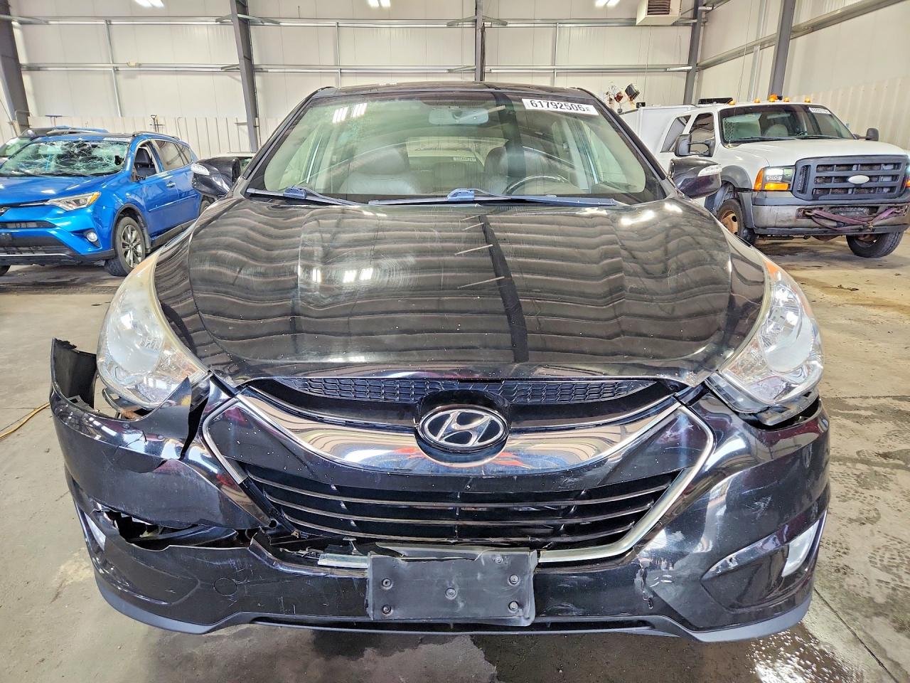 2012 Hyundai Tucson Limited Black vin: KM8JUCAC6CU475907