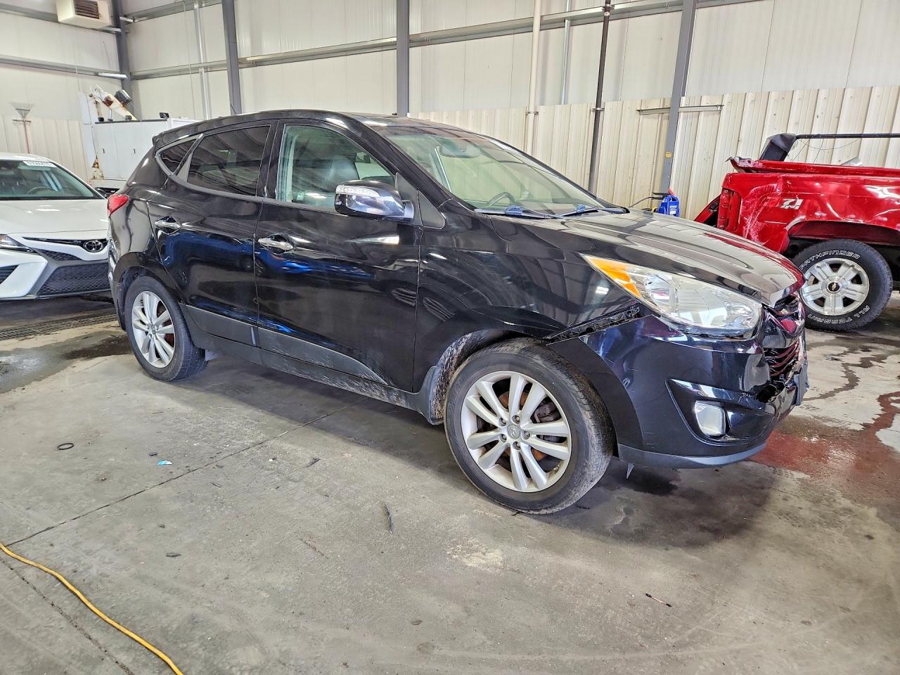 2012 Hyundai Tucson Limited Black vin: KM8JUCAC6CU475907
