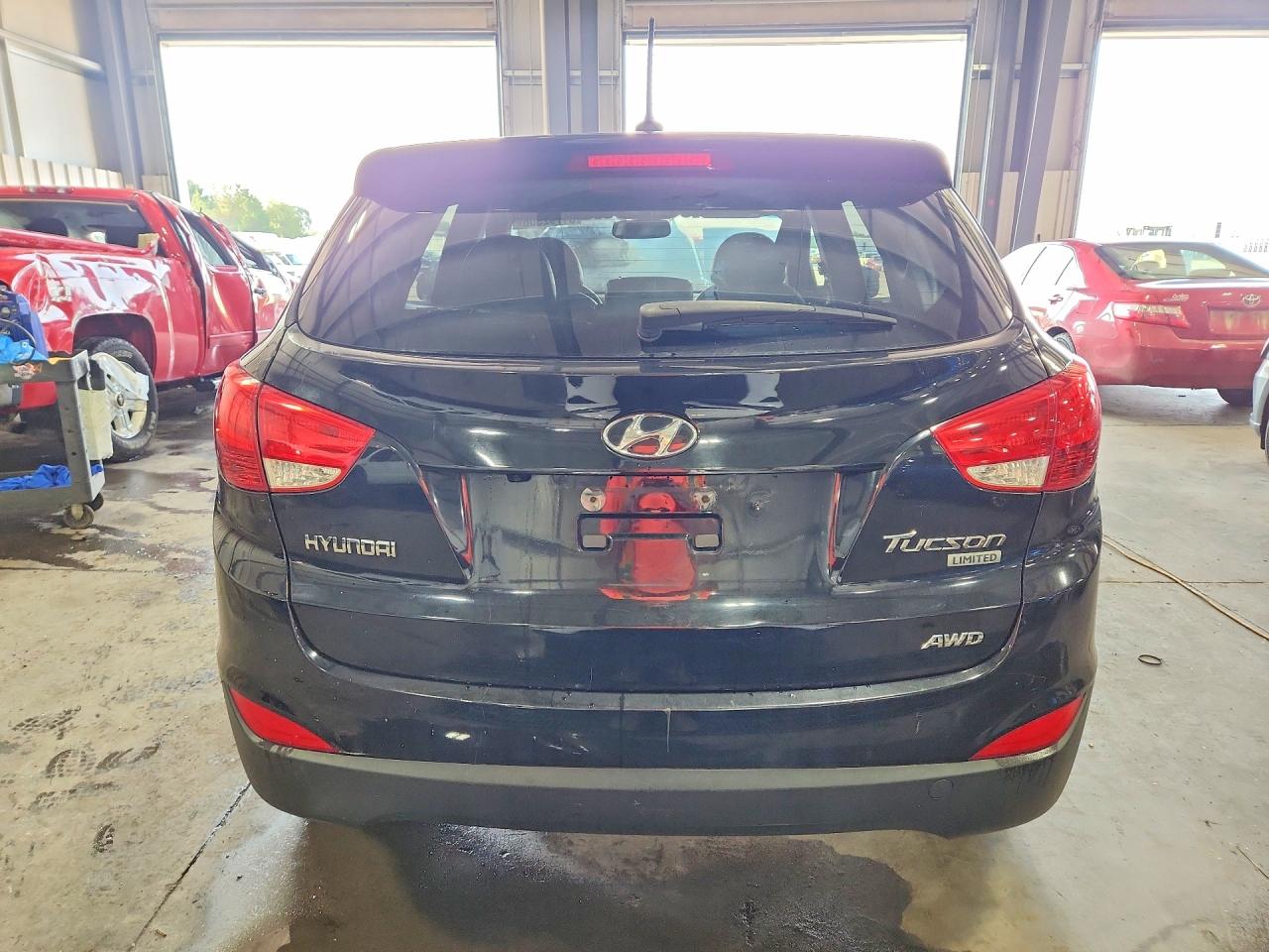 2012 Hyundai Tucson Limited Black vin: KM8JUCAC6CU475907