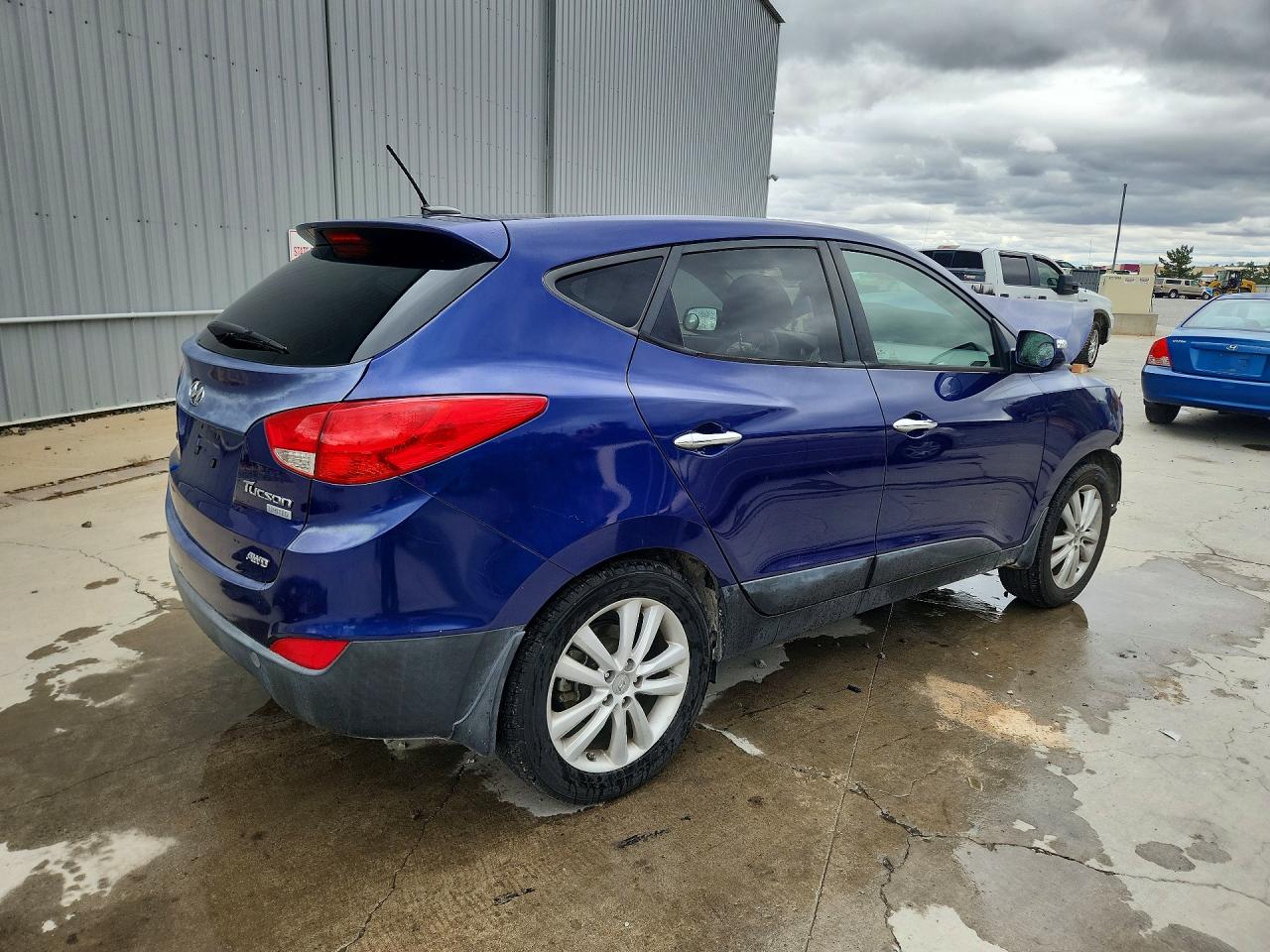 2012 Hyundai Tucson Limited Blue vin: KM8JUCAC7CU424500