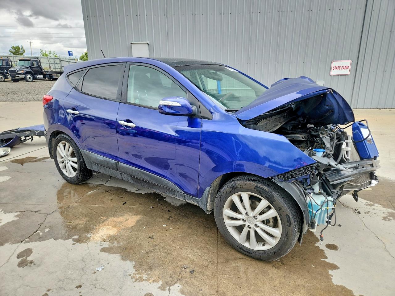 2012 Hyundai Tucson Limited Blue vin: KM8JUCAC7CU424500
