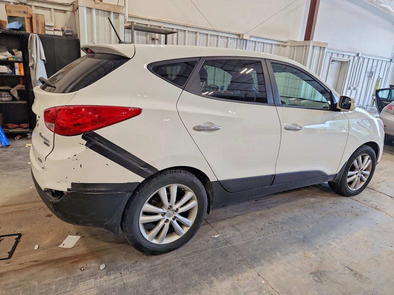 2012 Hyundai Tucson Limited Белый vin: KM8JUCAC7CU543924