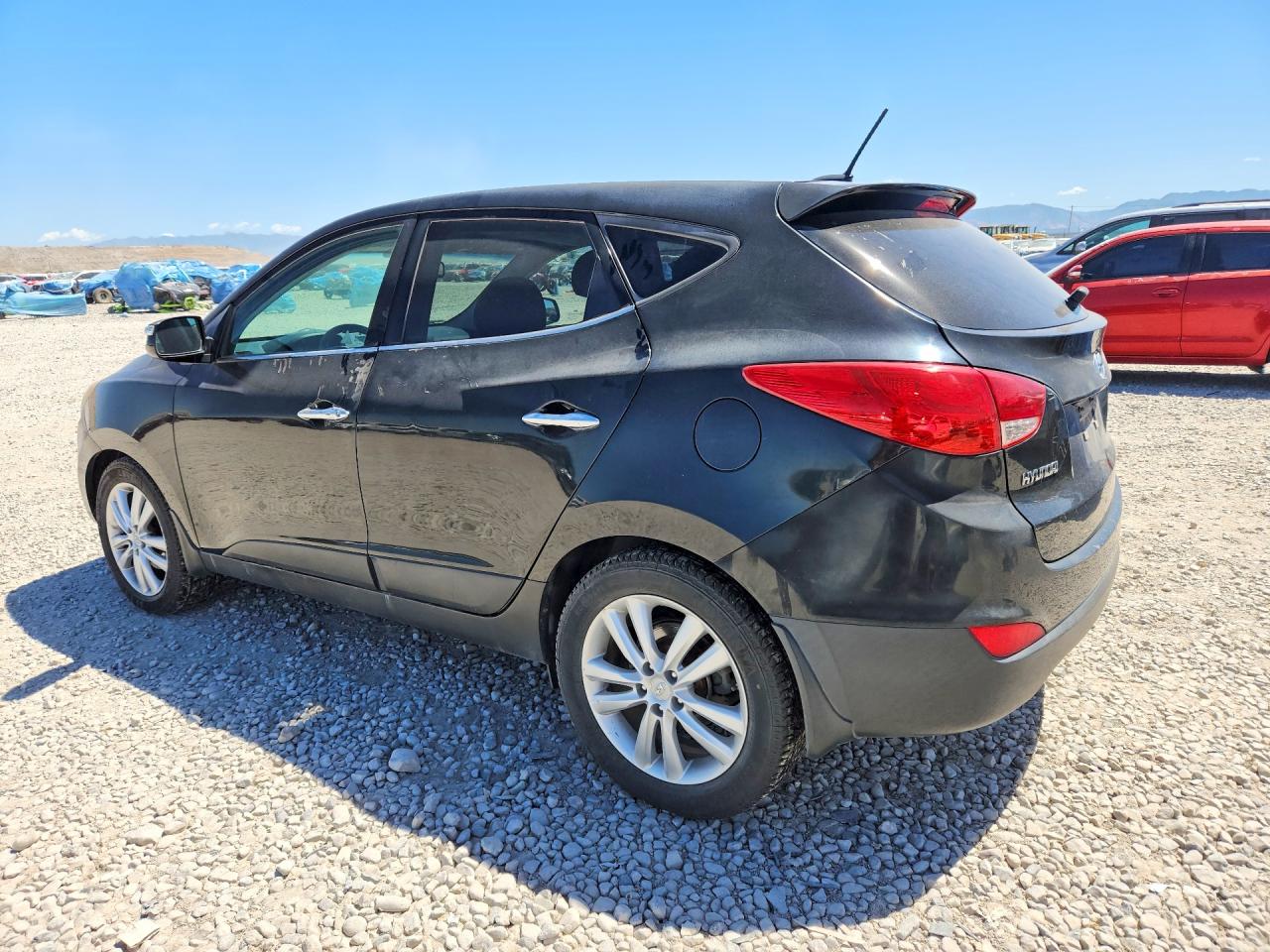 2013 Hyundai Tucson Limited Black vin: KM8JUCAC7DU581428