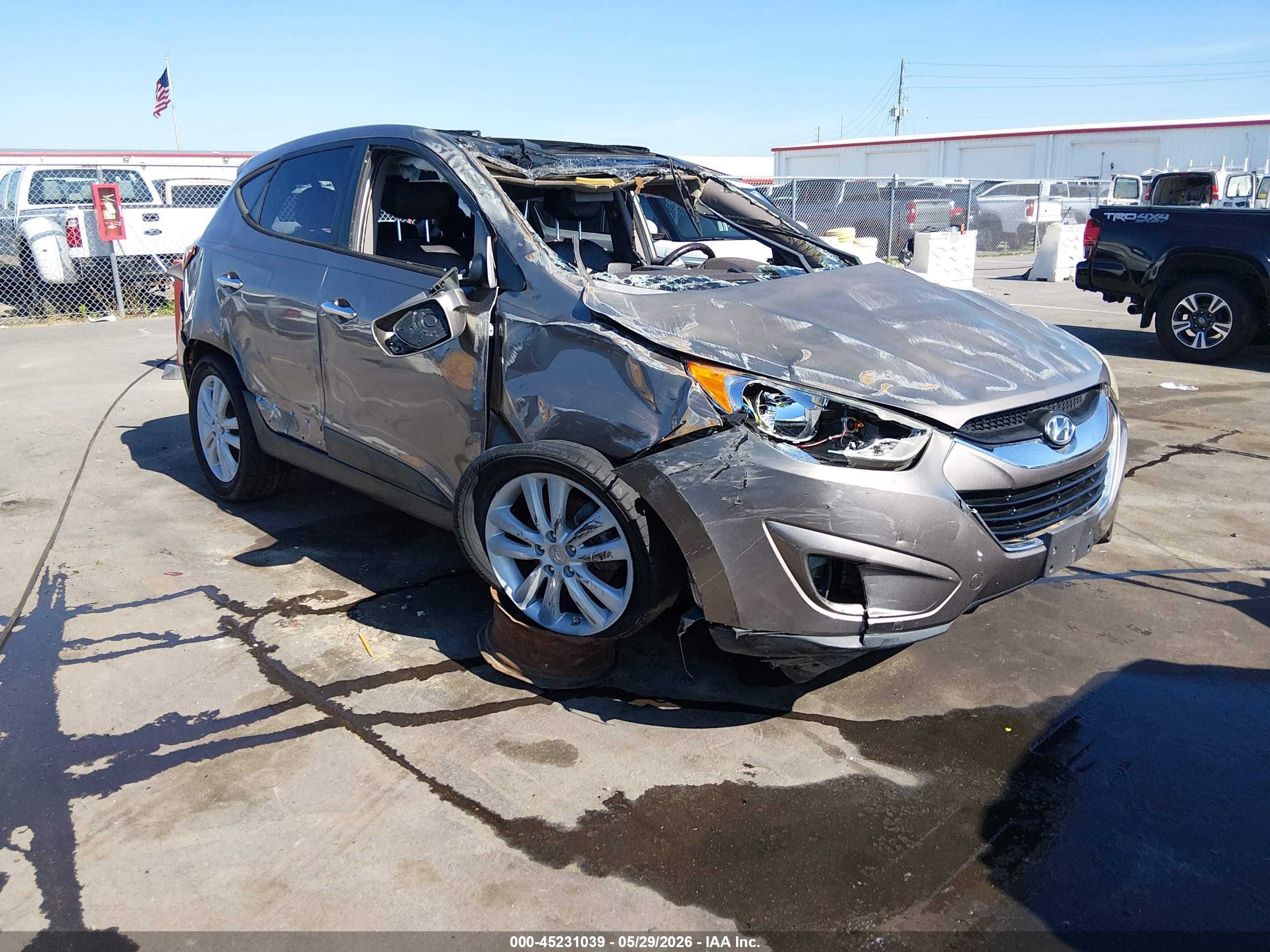 2012 Hyundai Tucson Limited Brown vin: KM8JUCAC8CU538005