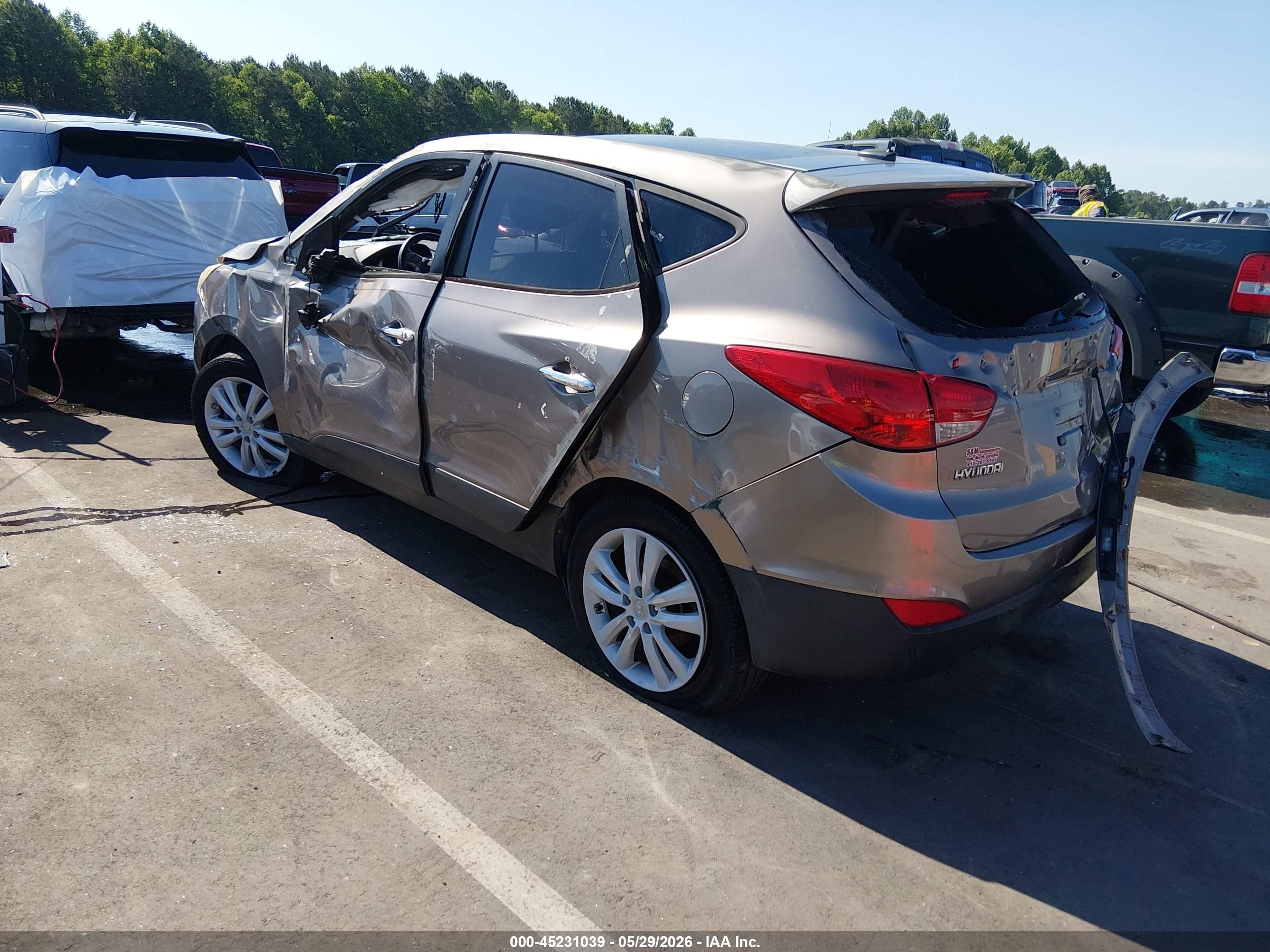 2012 Hyundai Tucson Limited Brown vin: KM8JUCAC8CU538005