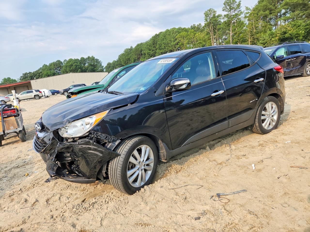 2011 Hyundai Tucson Limited Черный vin: KM8JUCAC9BU133172