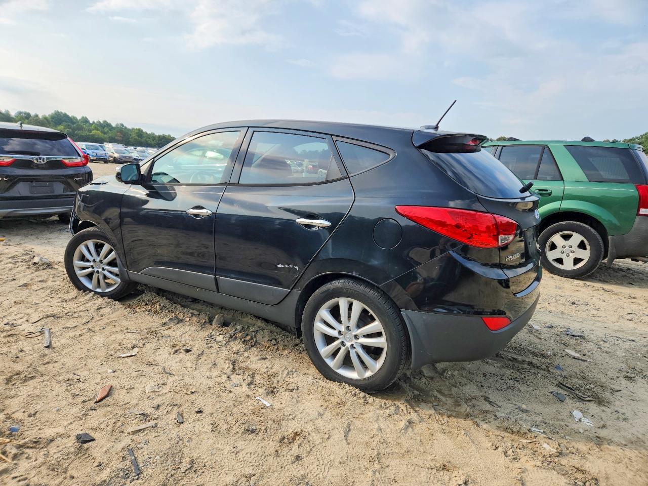 2011 Hyundai Tucson Limited Black vin: KM8JUCAC9BU133172