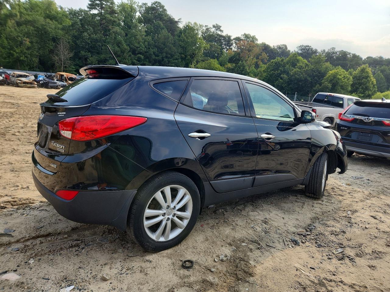 2011 Hyundai Tucson Limited Black vin: KM8JUCAC9BU133172