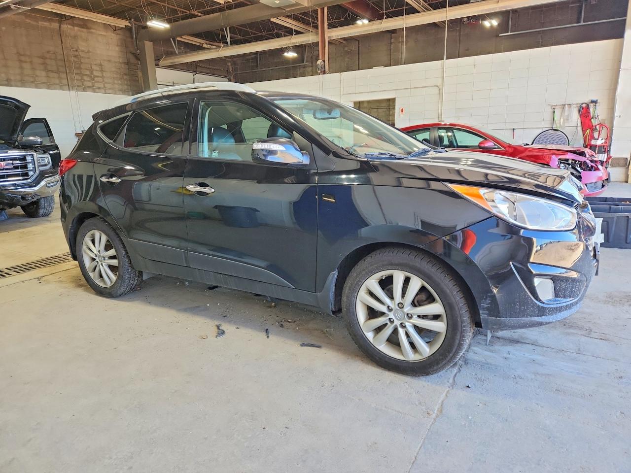 2011 Hyundai Tucson Limited Black vin: KM8JUCAC9BU310738